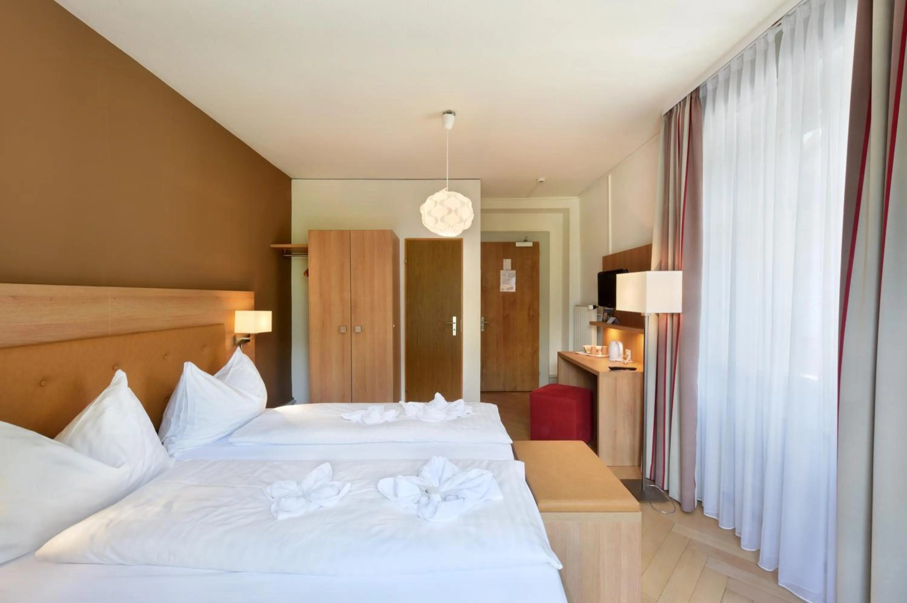 Photo of the whole room, Bed in Waldhotel Unspunnen