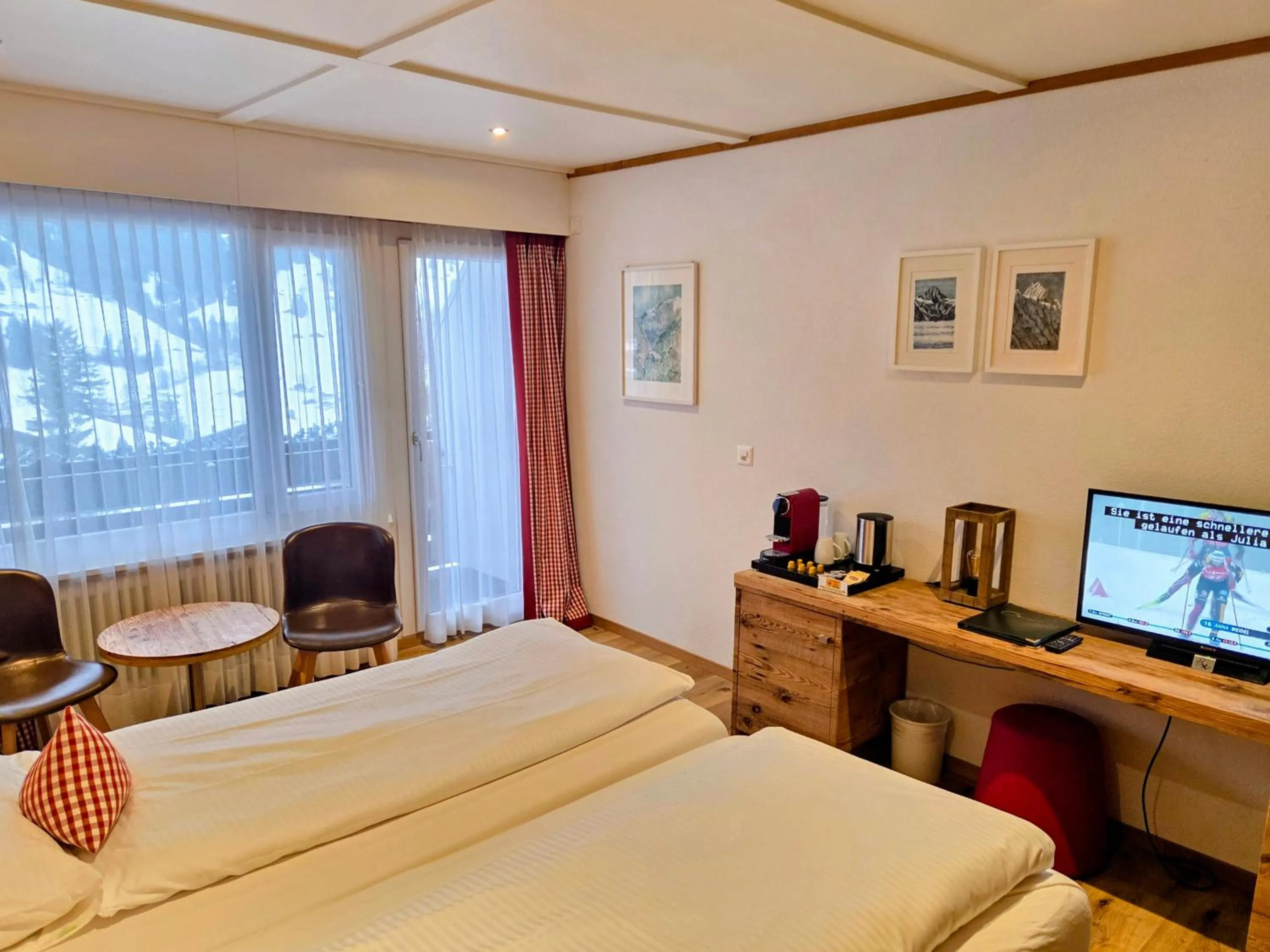 Photo of the whole room, Bed in Hotel Bernerhof Grindelwald