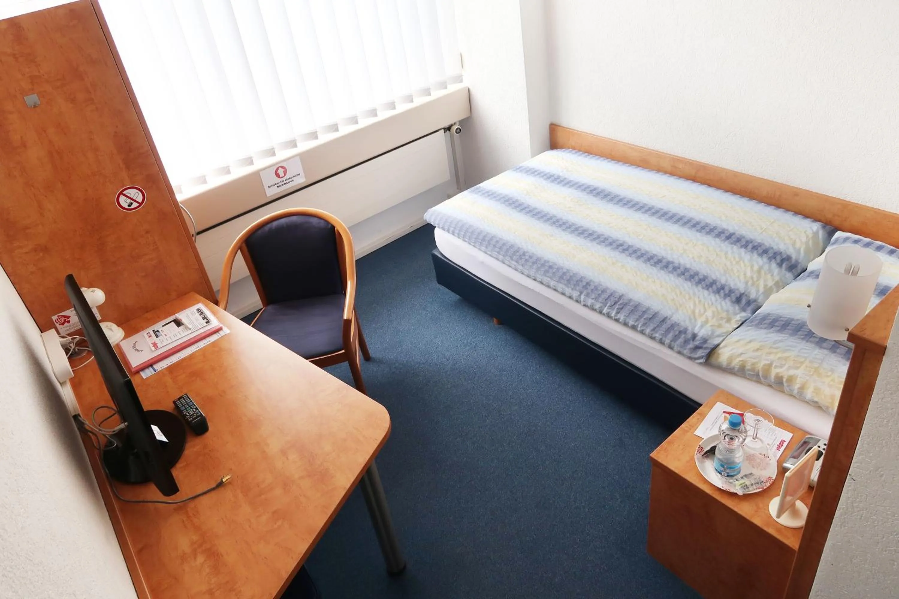 Bed in Budget Motel Self Check-In