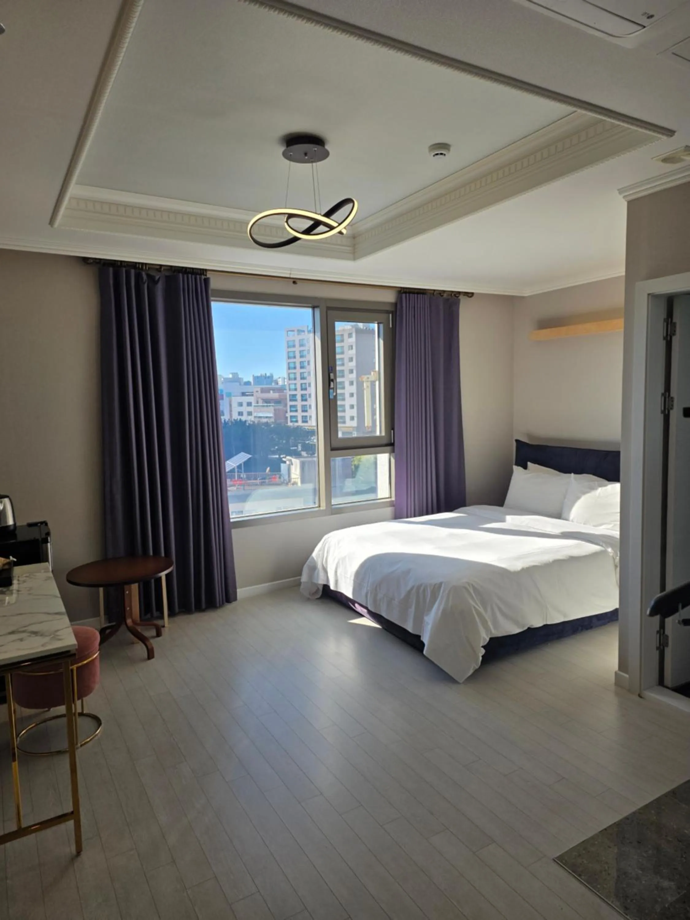 Bed in Cornerstone Hotel