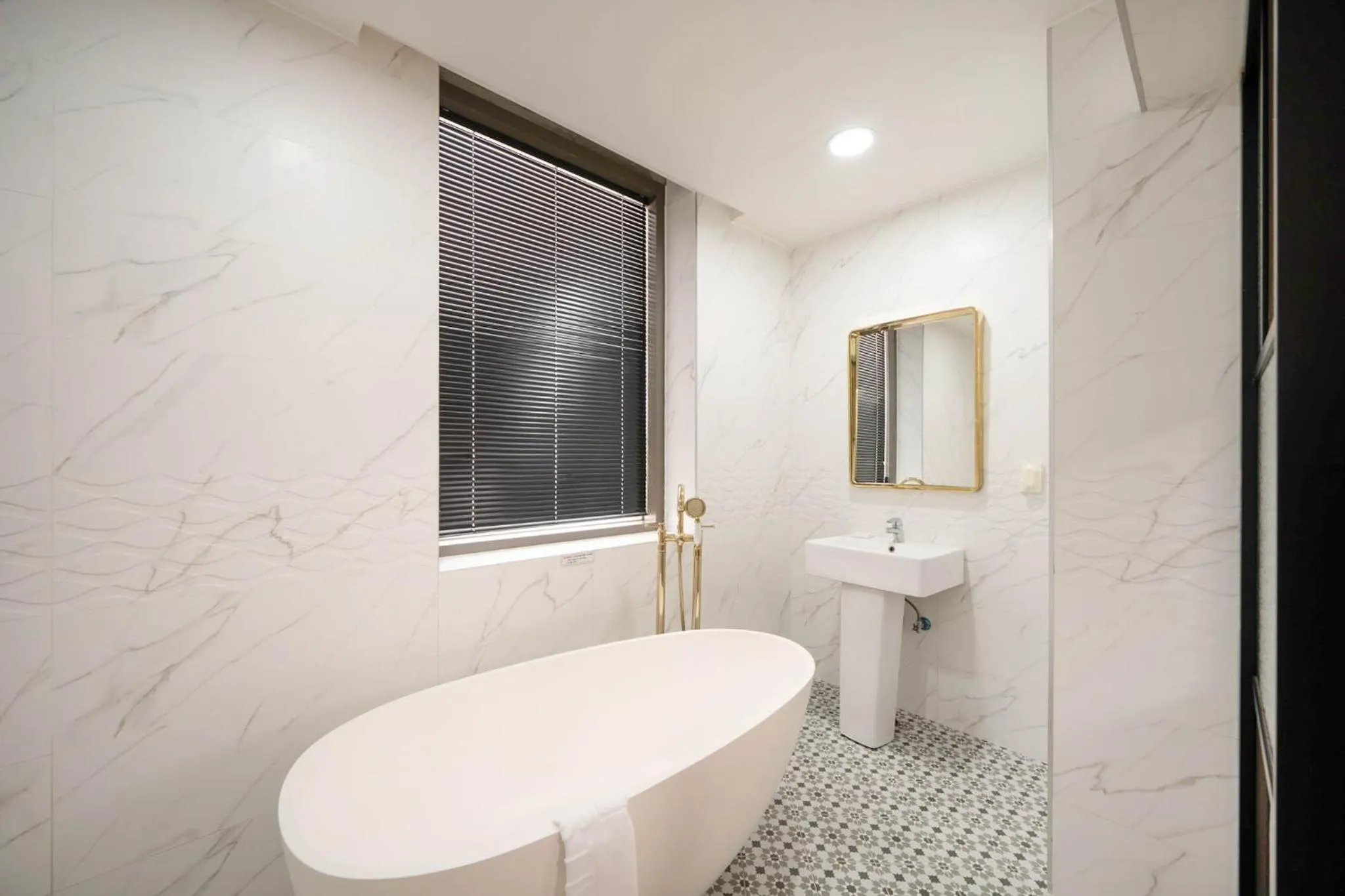 Toilet in Cornerstone Hotel