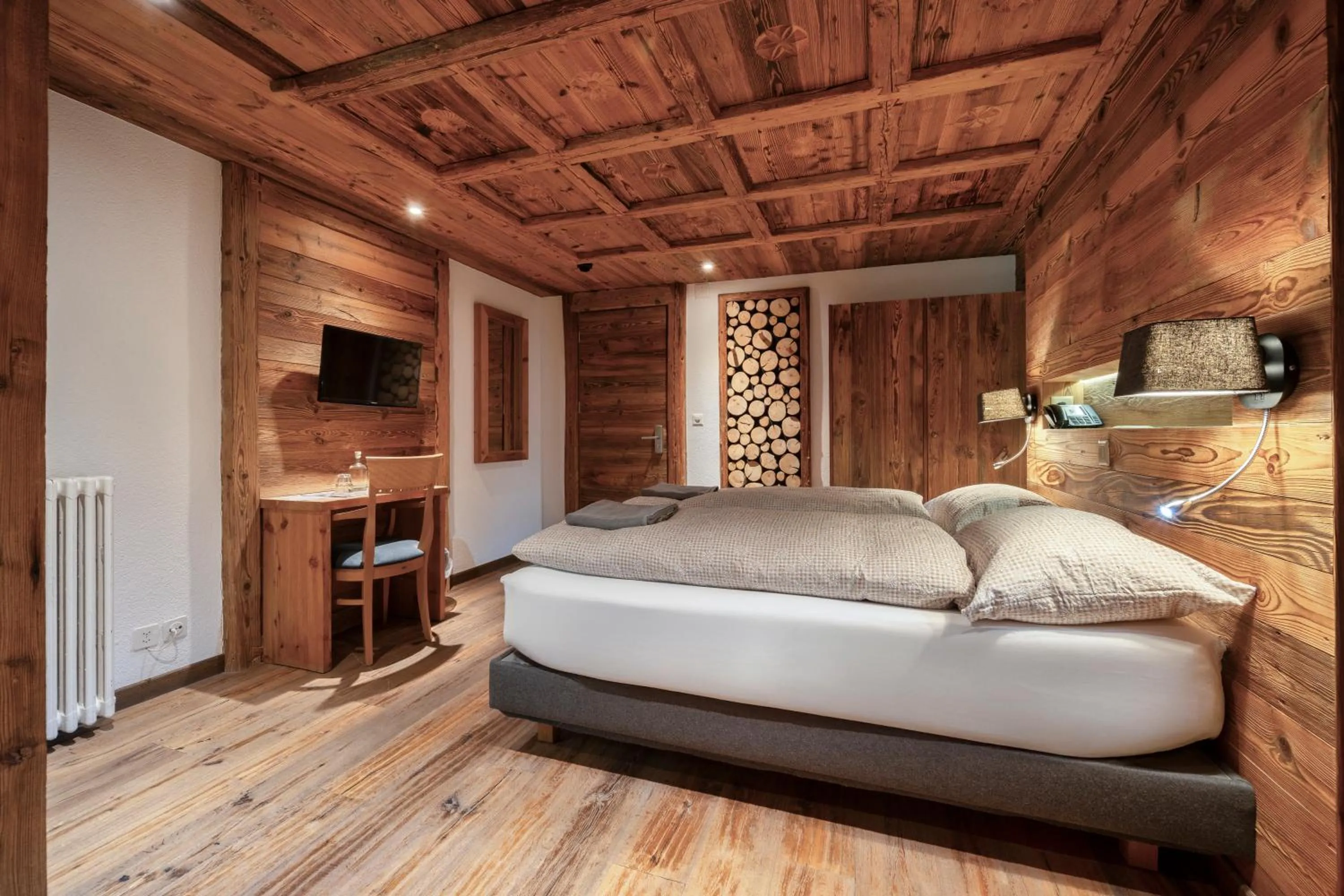 Bed in Hôtel Le Grand Chalet