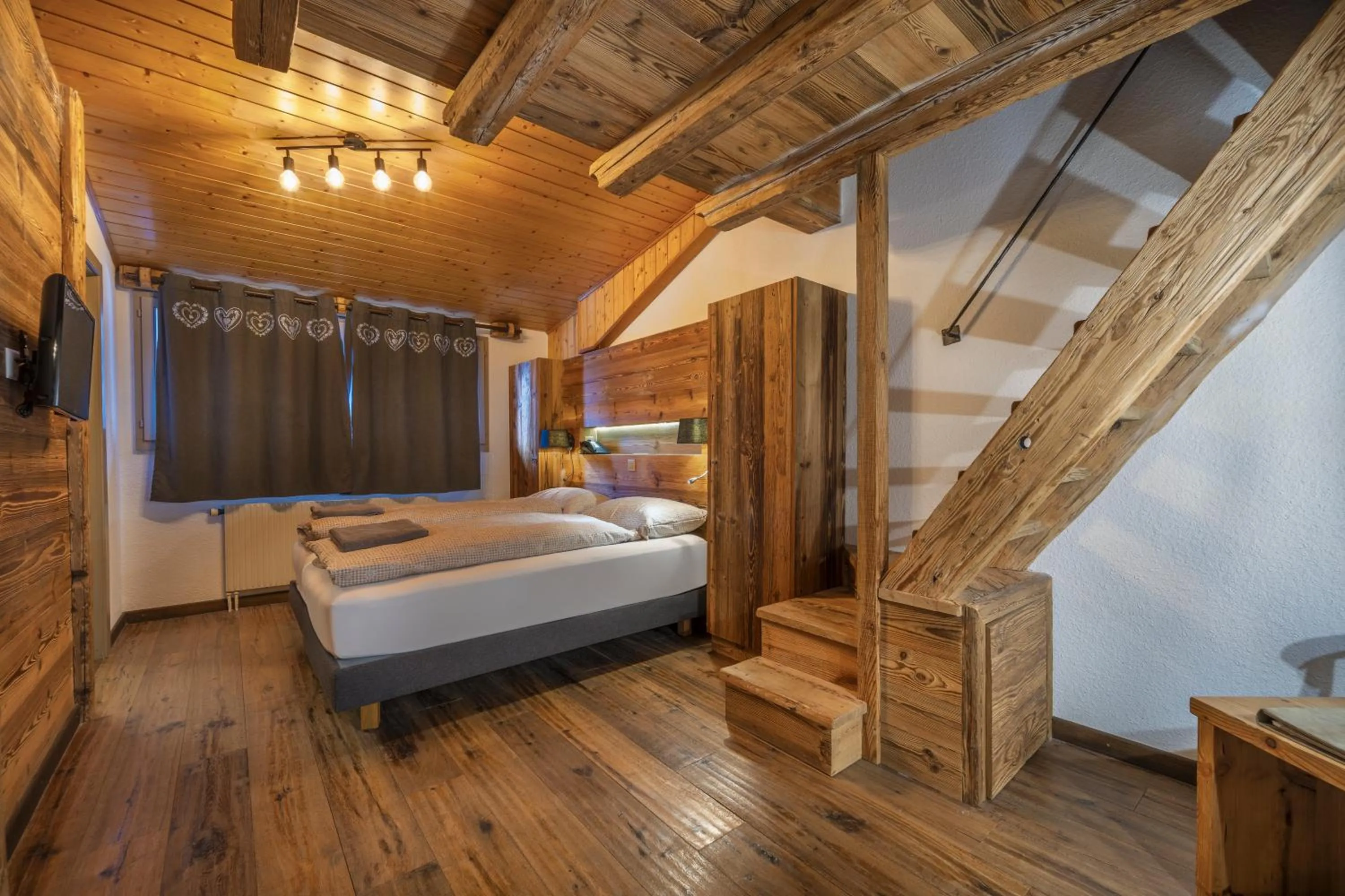 Bed in Hôtel Le Grand Chalet