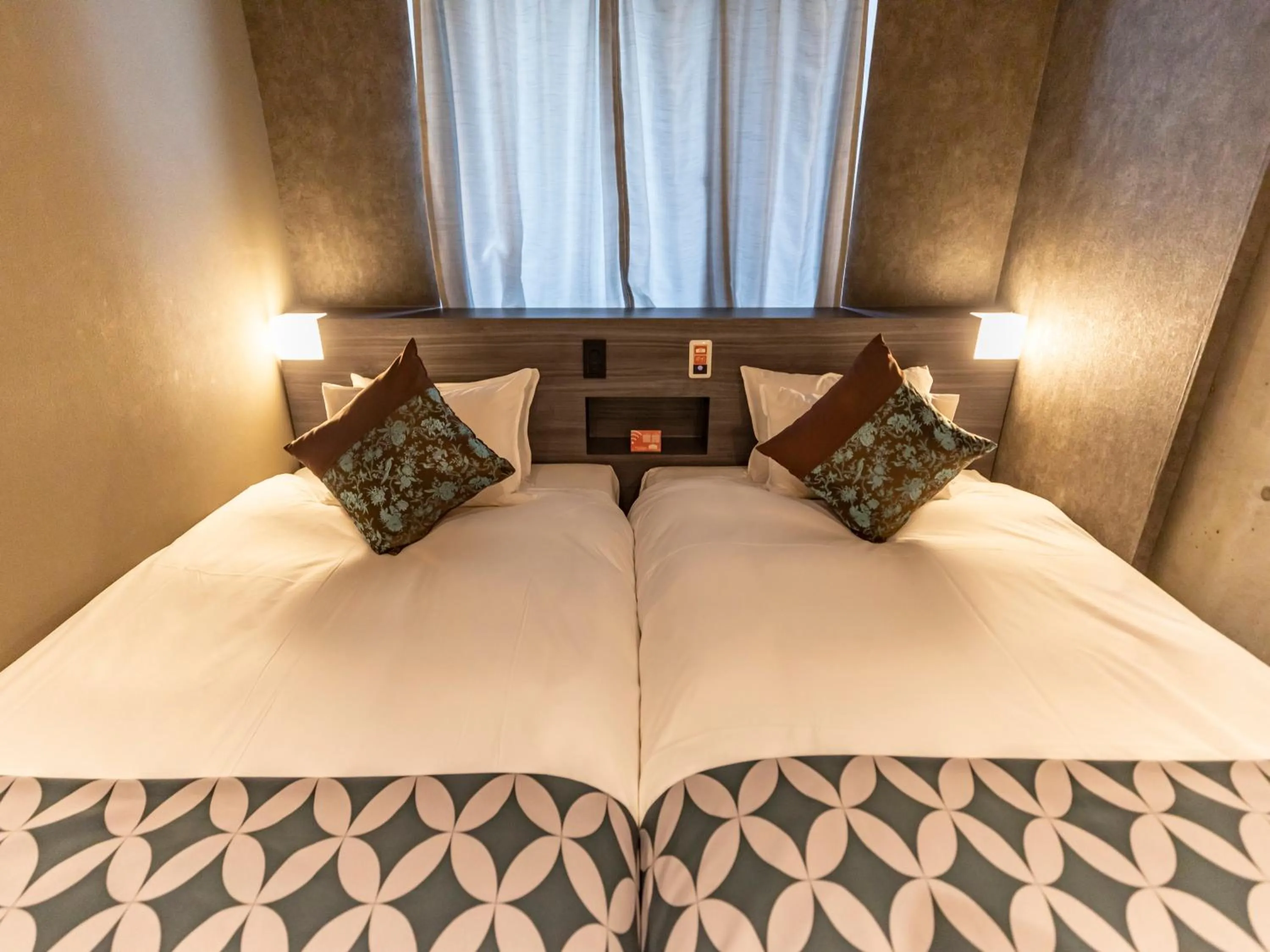 Bed in Hale Kyoto Tambaguchi Umekoji Park North