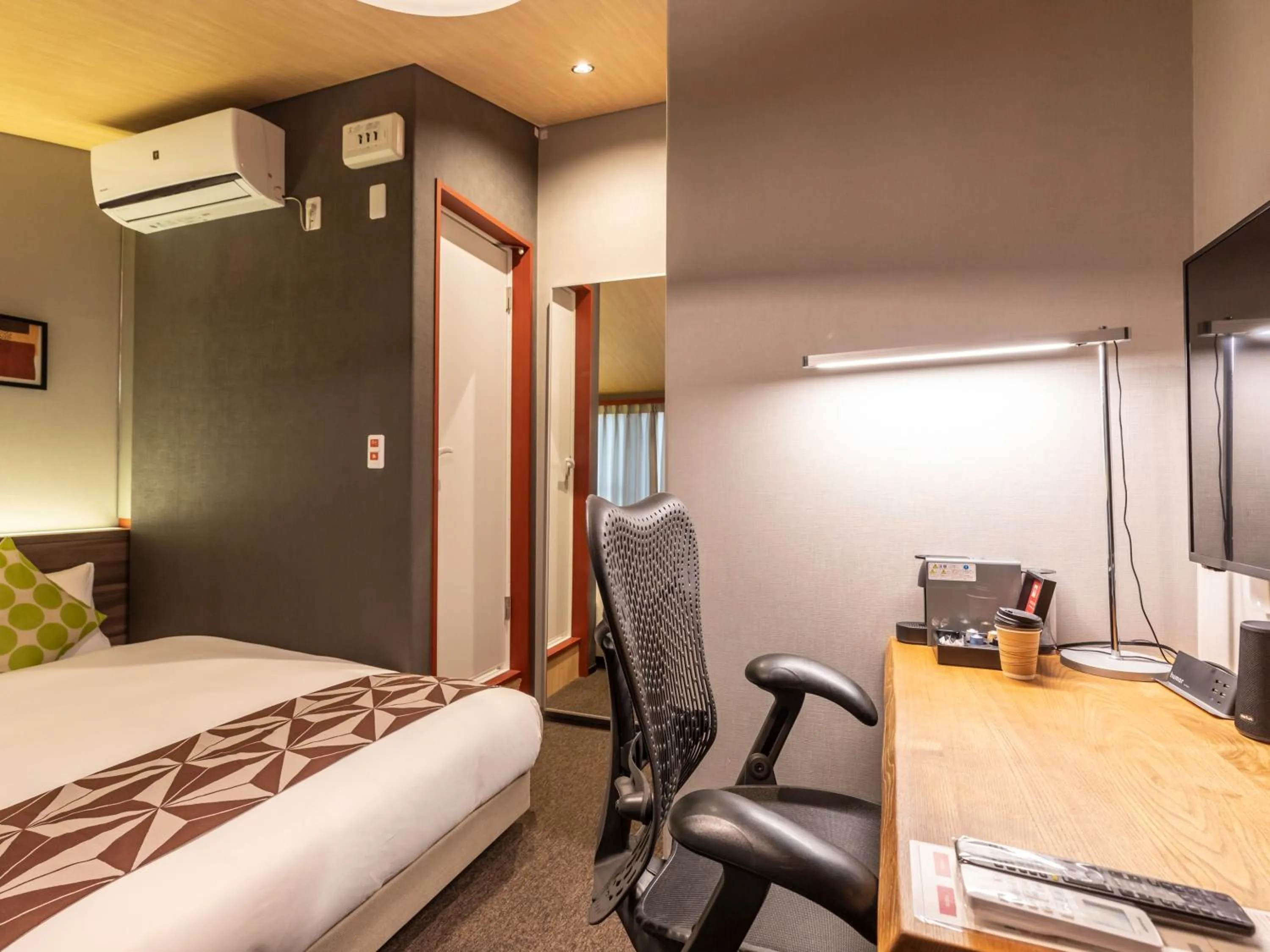 Bed in HALE Kyoto Toji