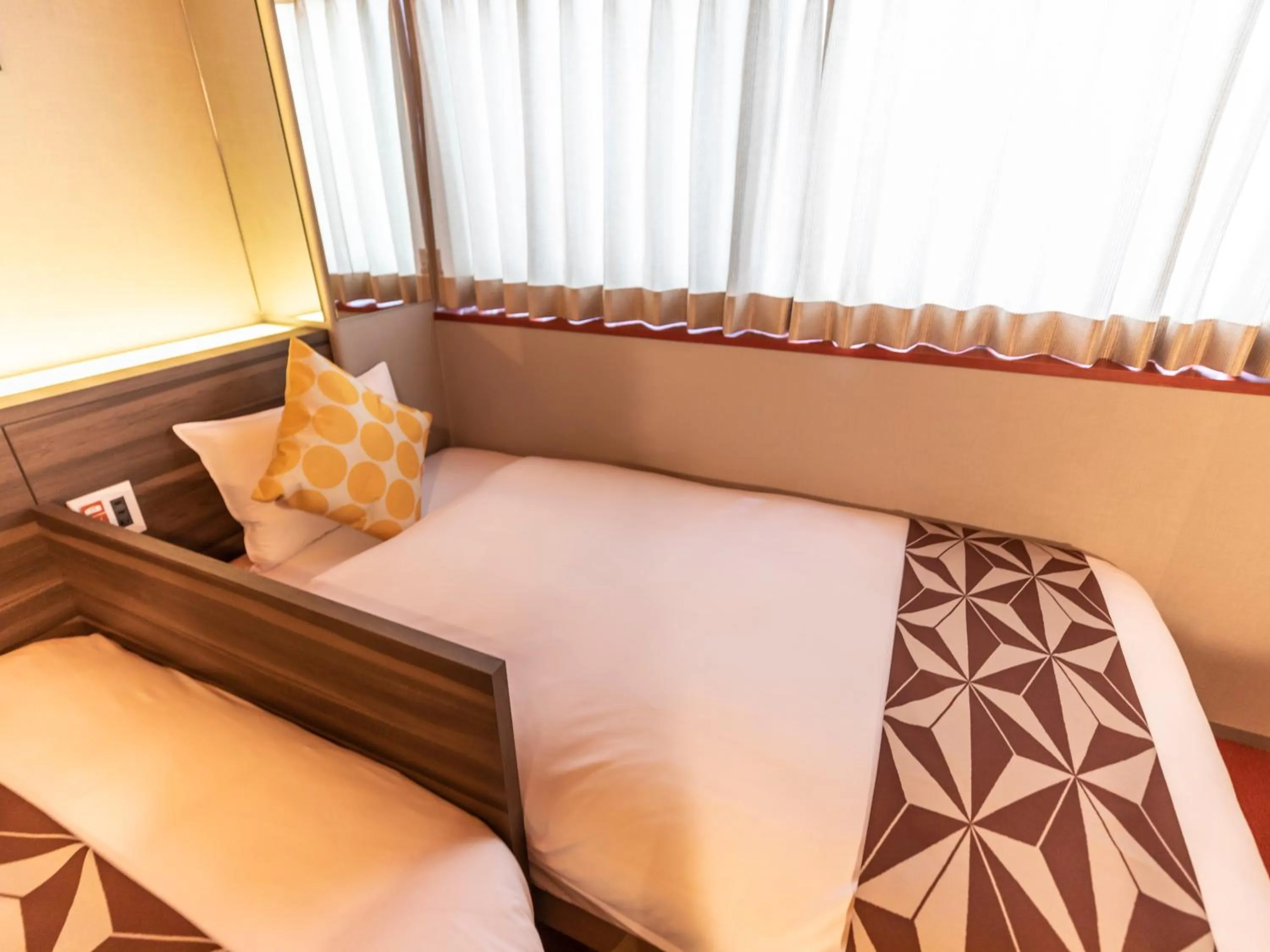 Bed in HALE Kyoto Toji