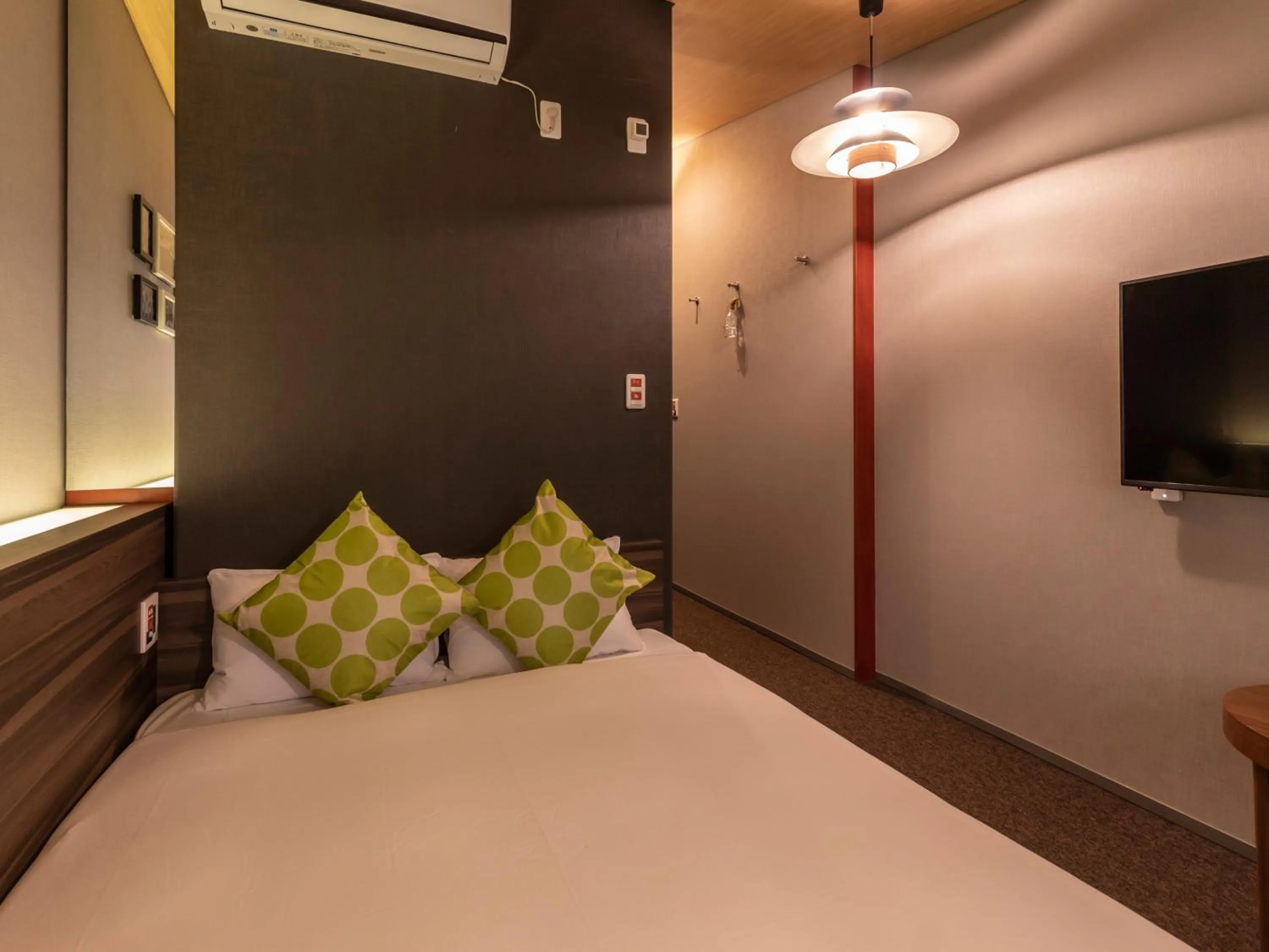 Bed in HALE Kyoto Toji