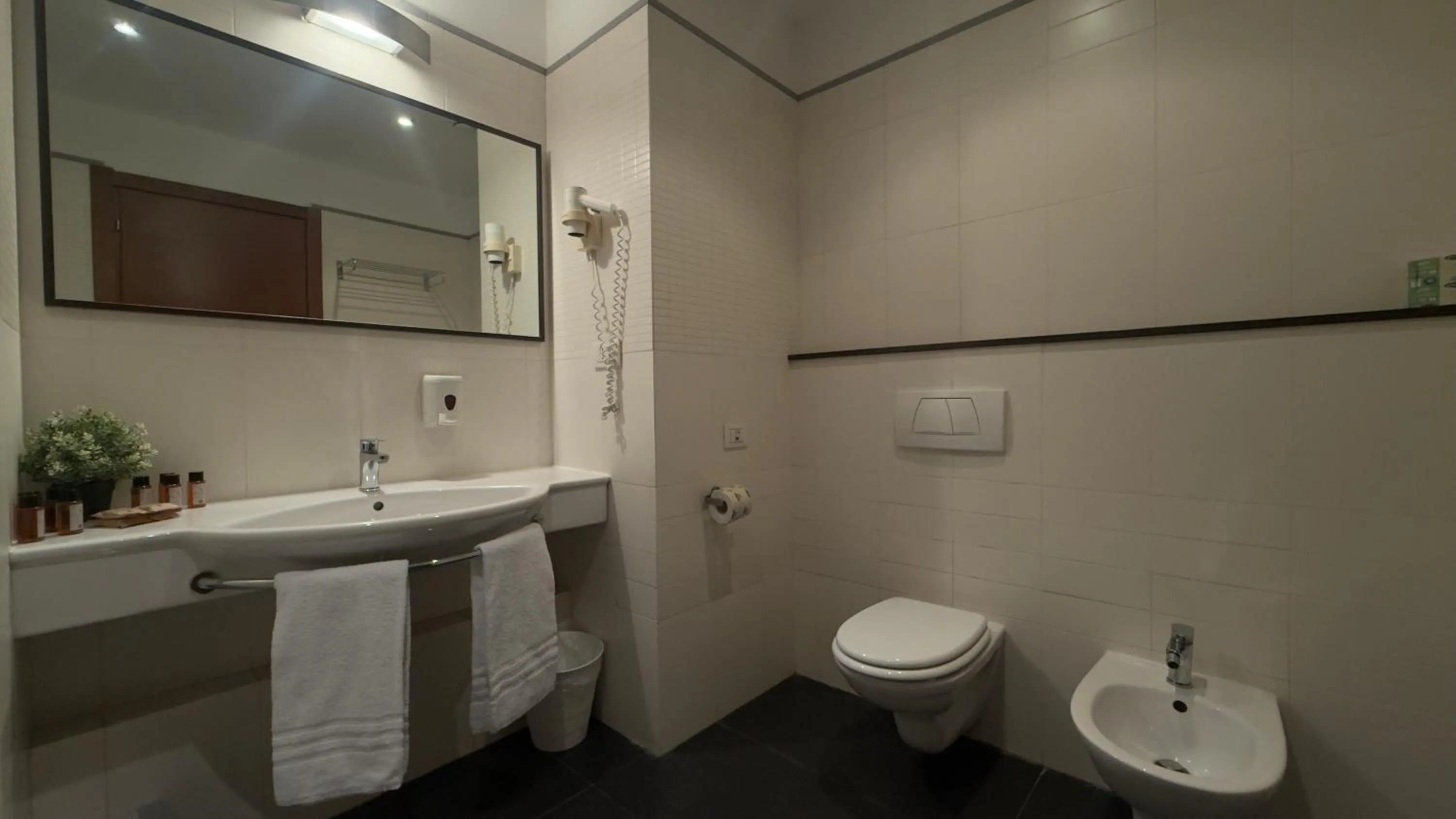 Bathroom in Romalive Hotel