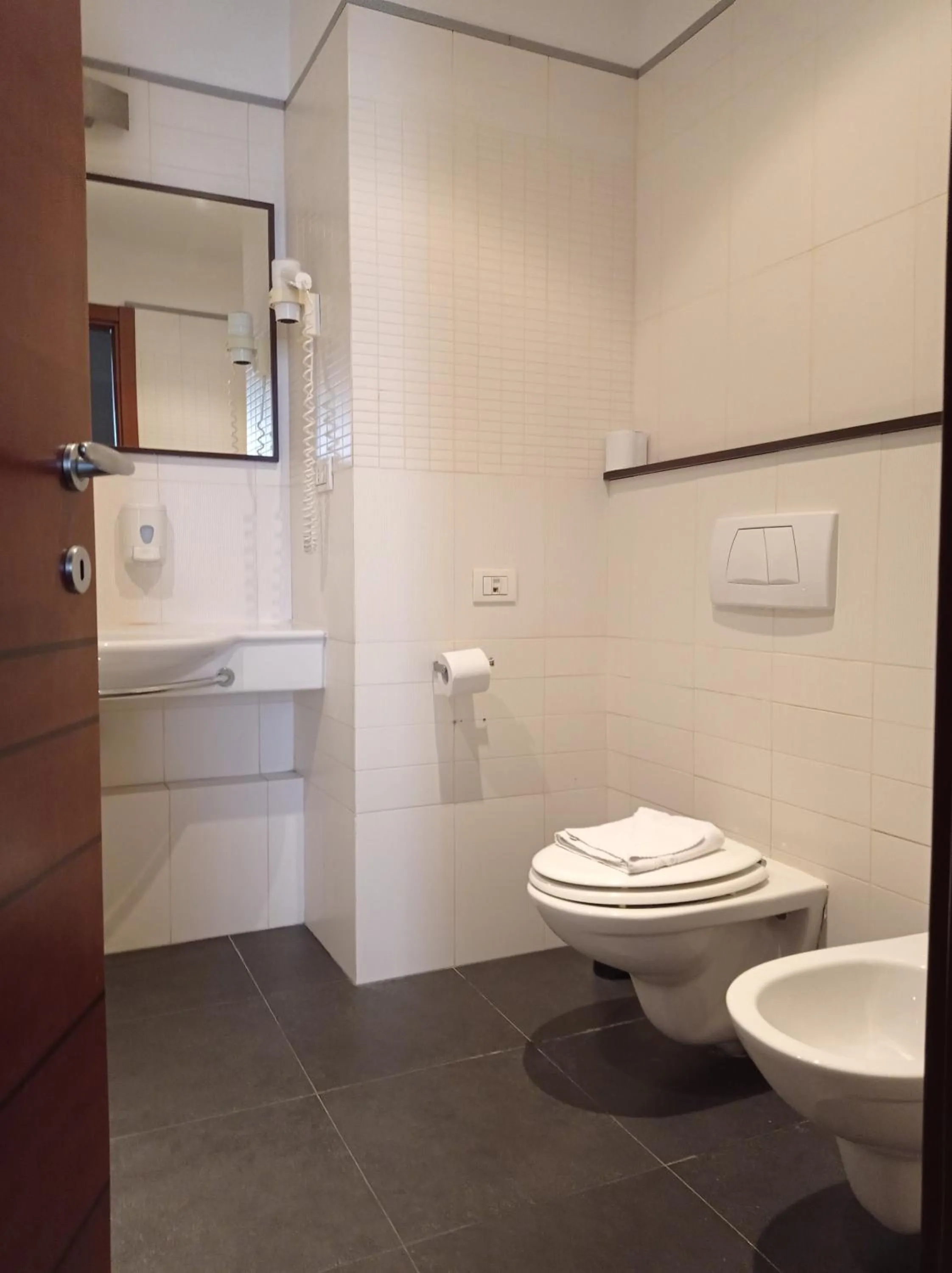 Bathroom in Romalive Hotel