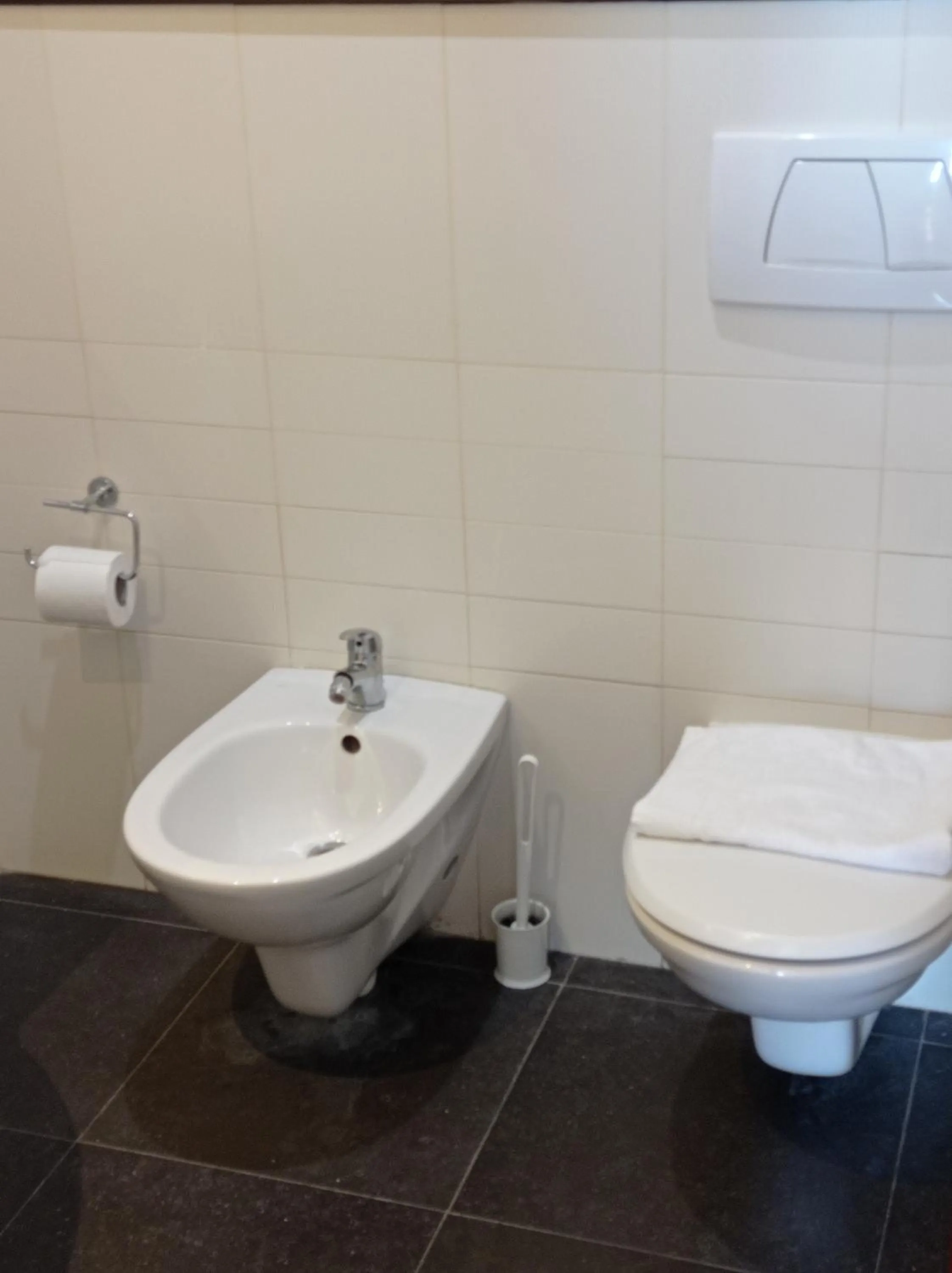 Bathroom in Romalive Hotel