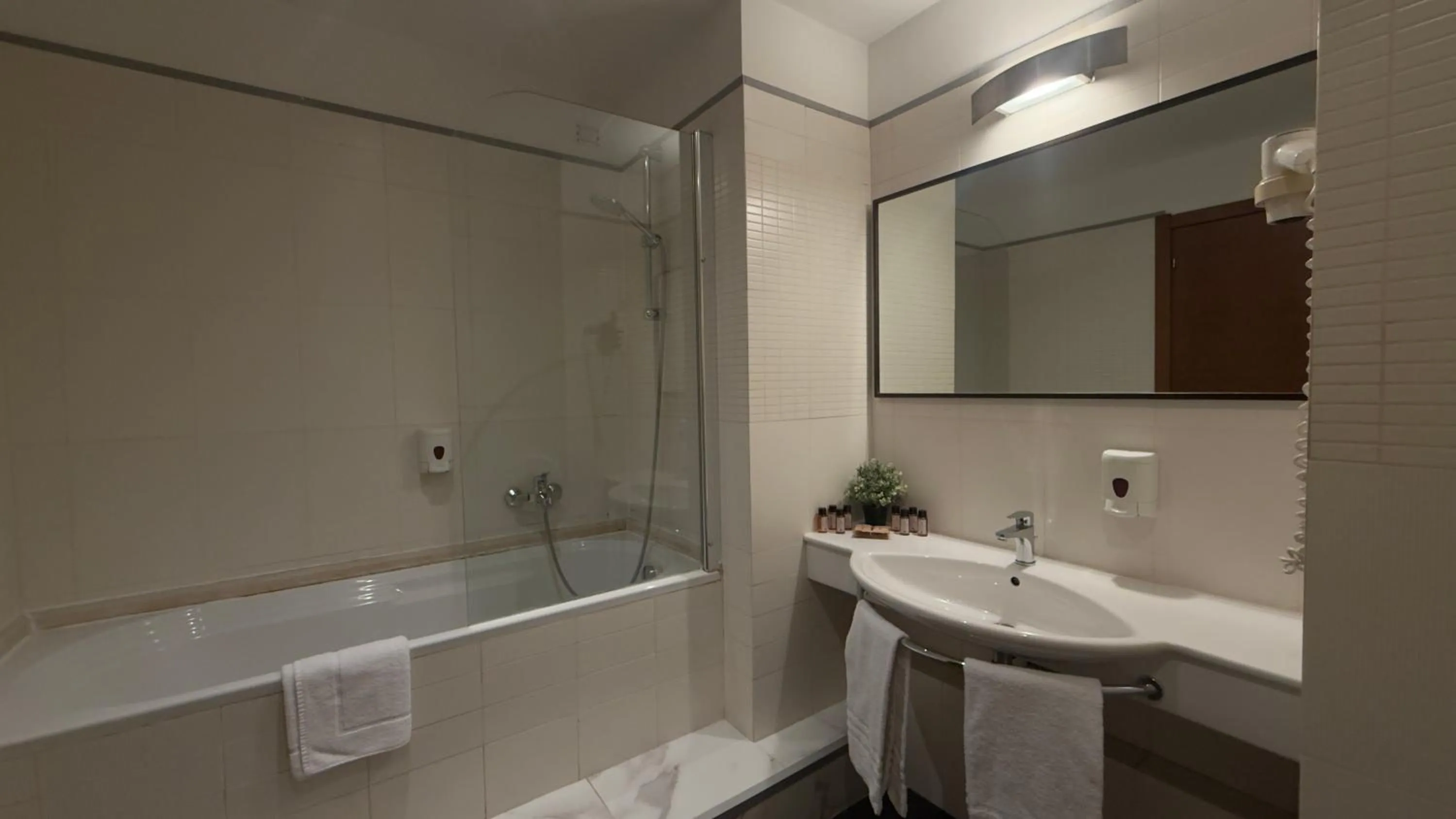 Bathroom in Romalive Hotel