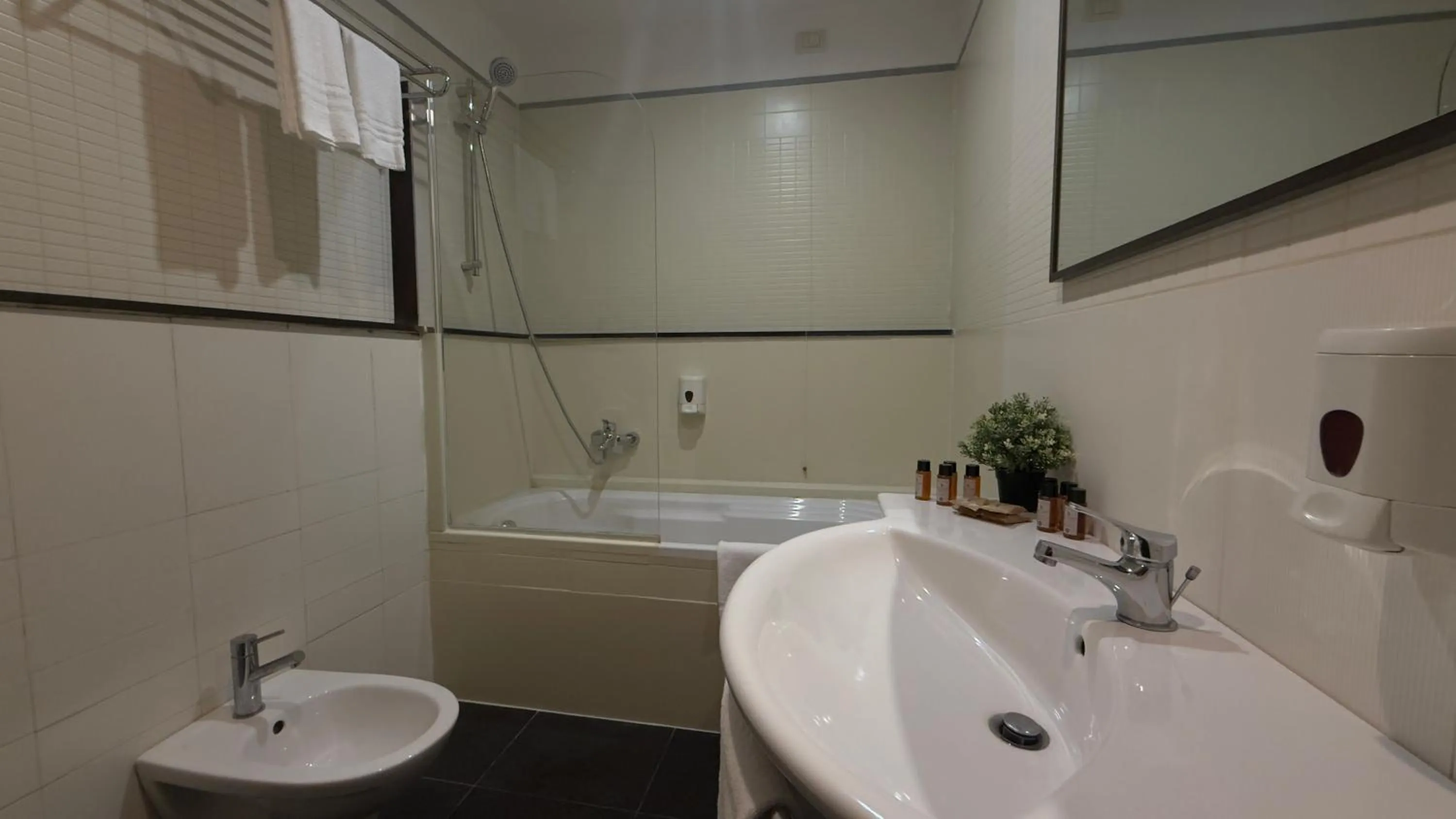 Bathroom in Romalive Hotel