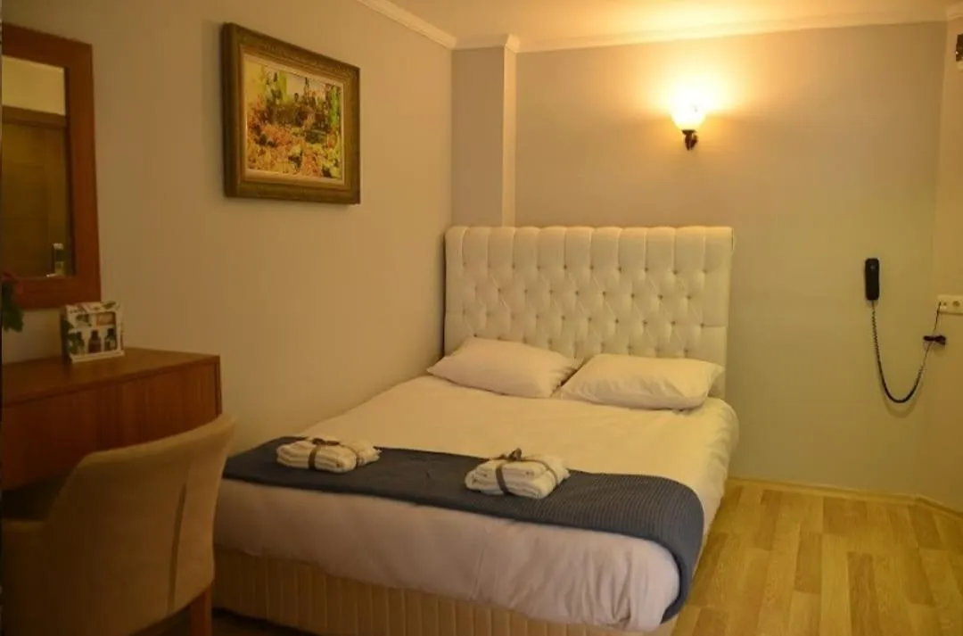 Bed in Pure Diamond Hotel