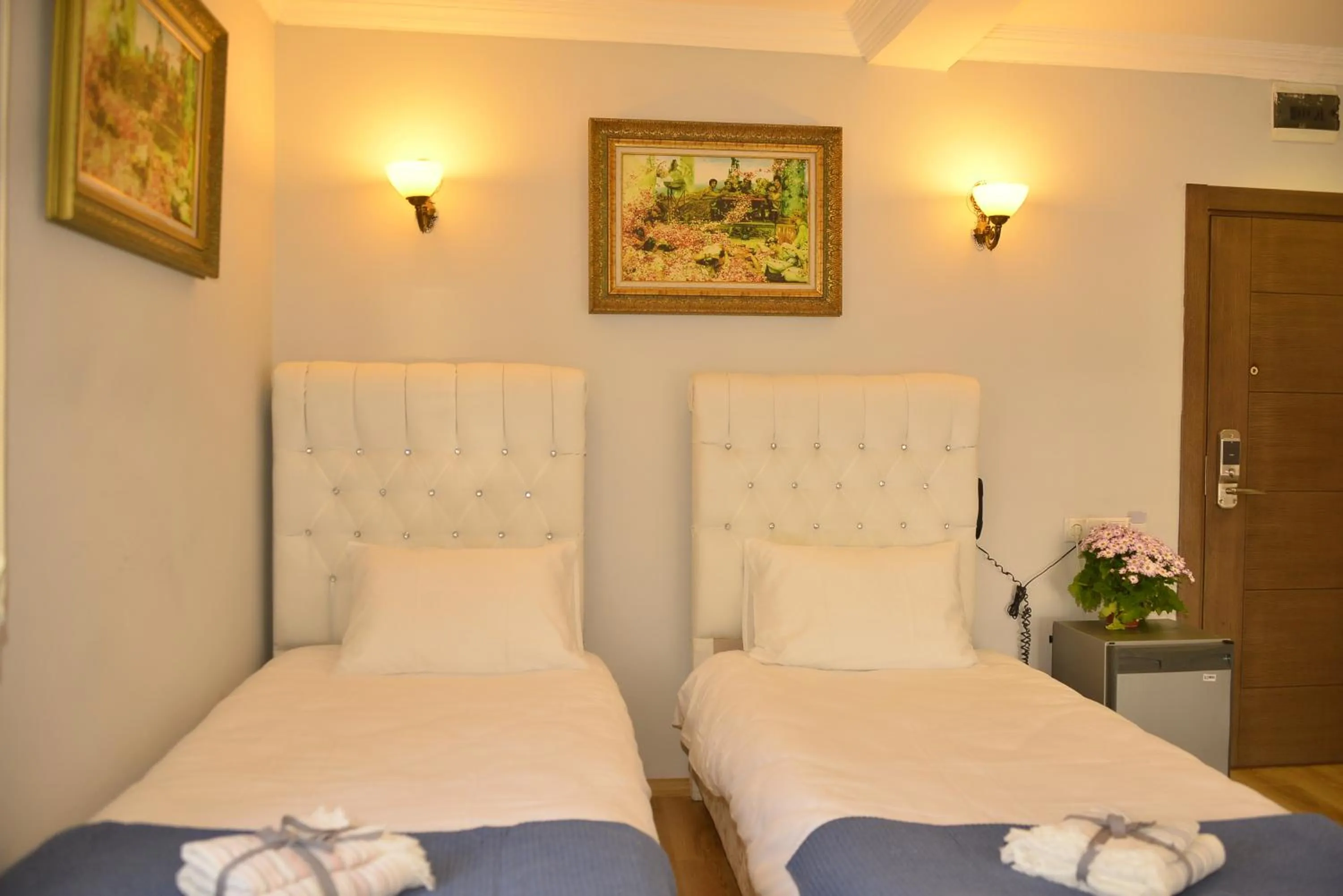 Bed in Pure Diamond Hotel