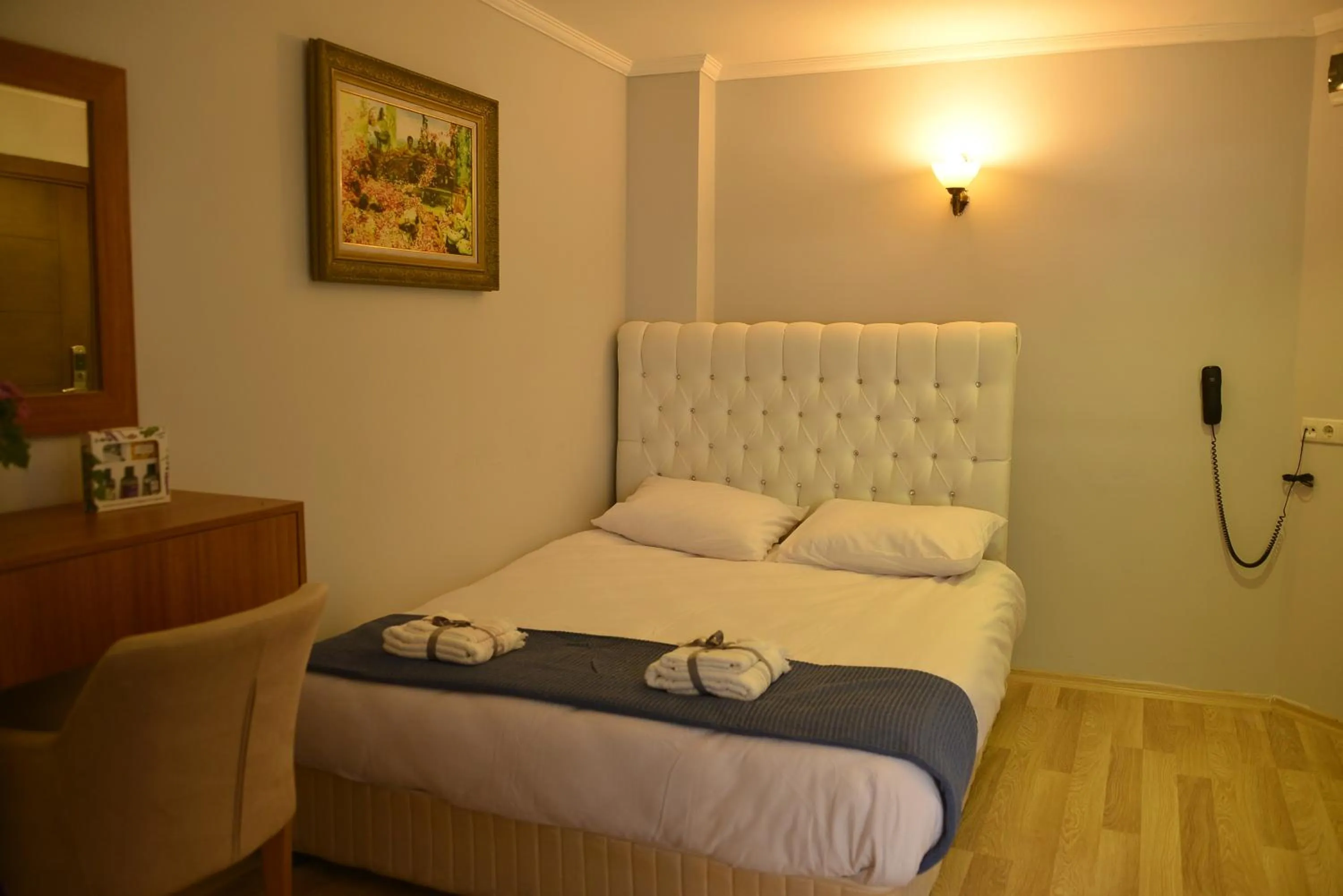 Bed in Pure Diamond Hotel