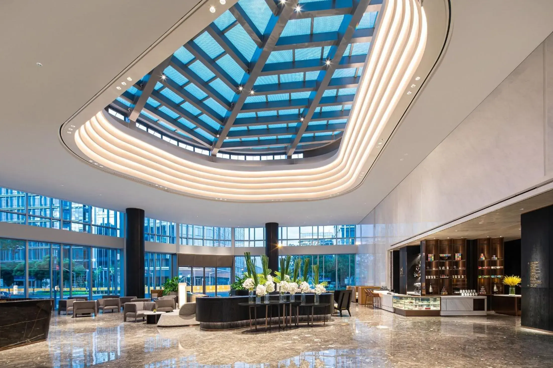 Lobby or reception in Crowne Plaza Shanghai Hongqiao by IHG Lobby or reception in Crowne Plaza Shanghai Hongqiao by IHG