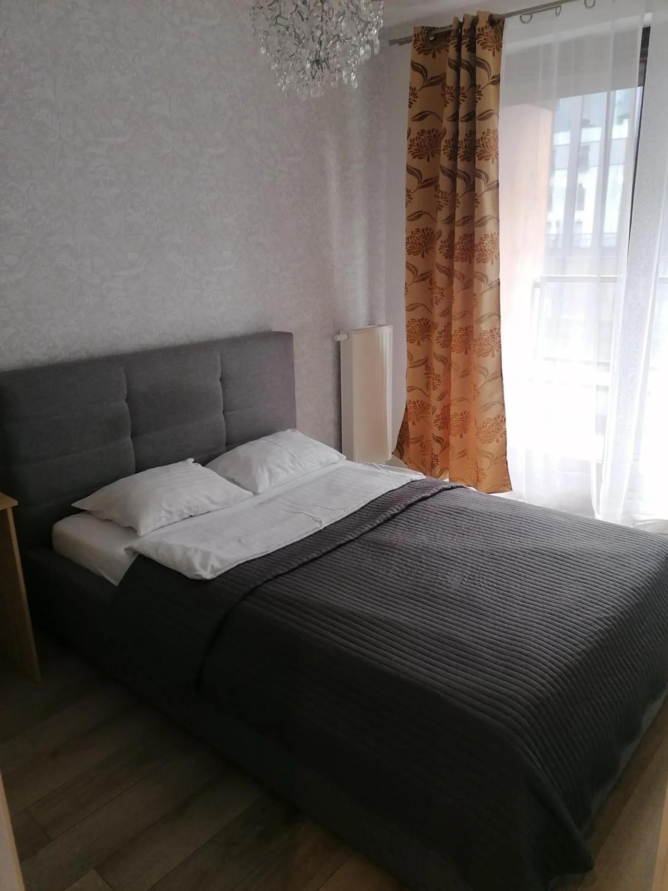 Bedroom, Bed in Apartamenty Warszawskie delux Siedmiogrodzka