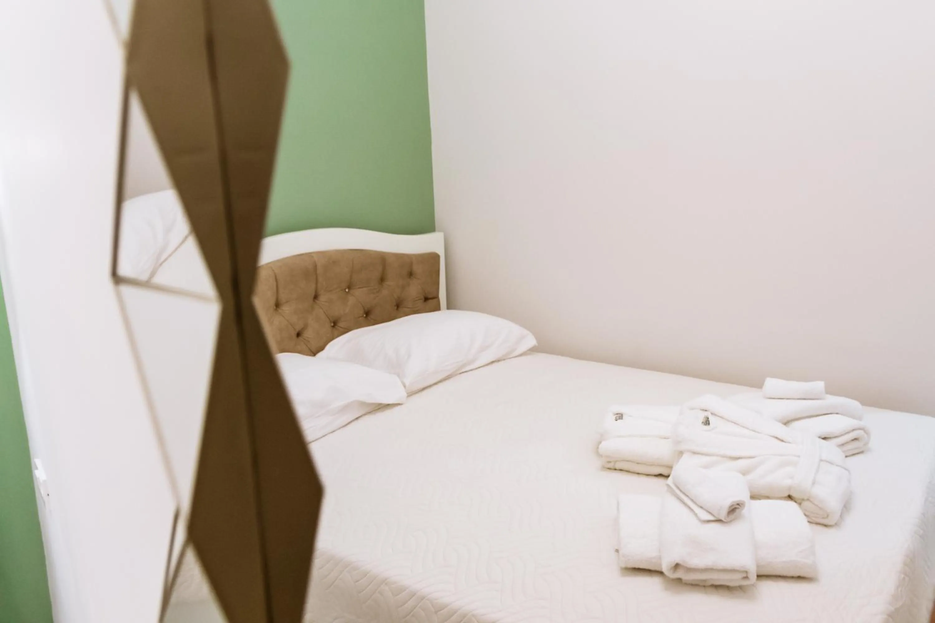 Bed in Konmari Boutique Suites