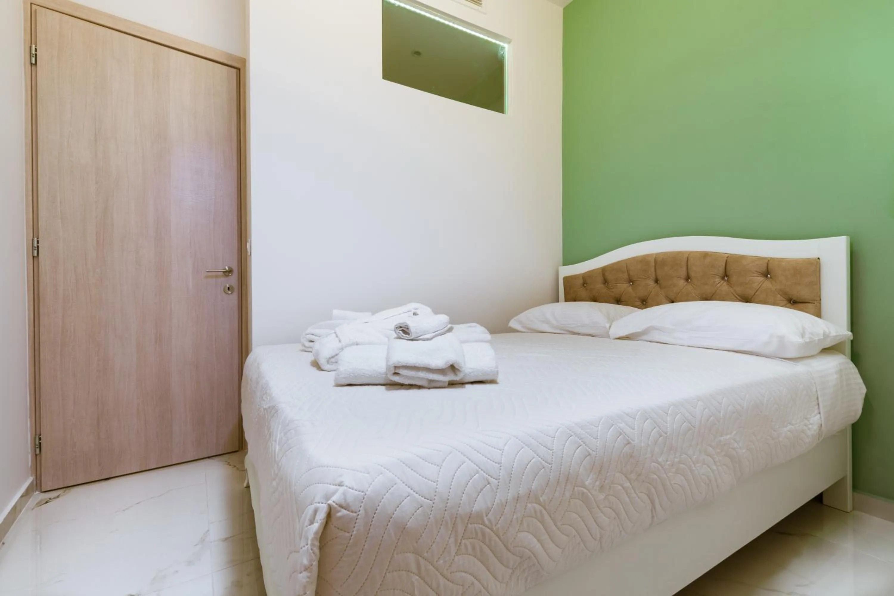 Bed in Konmari Boutique Suites