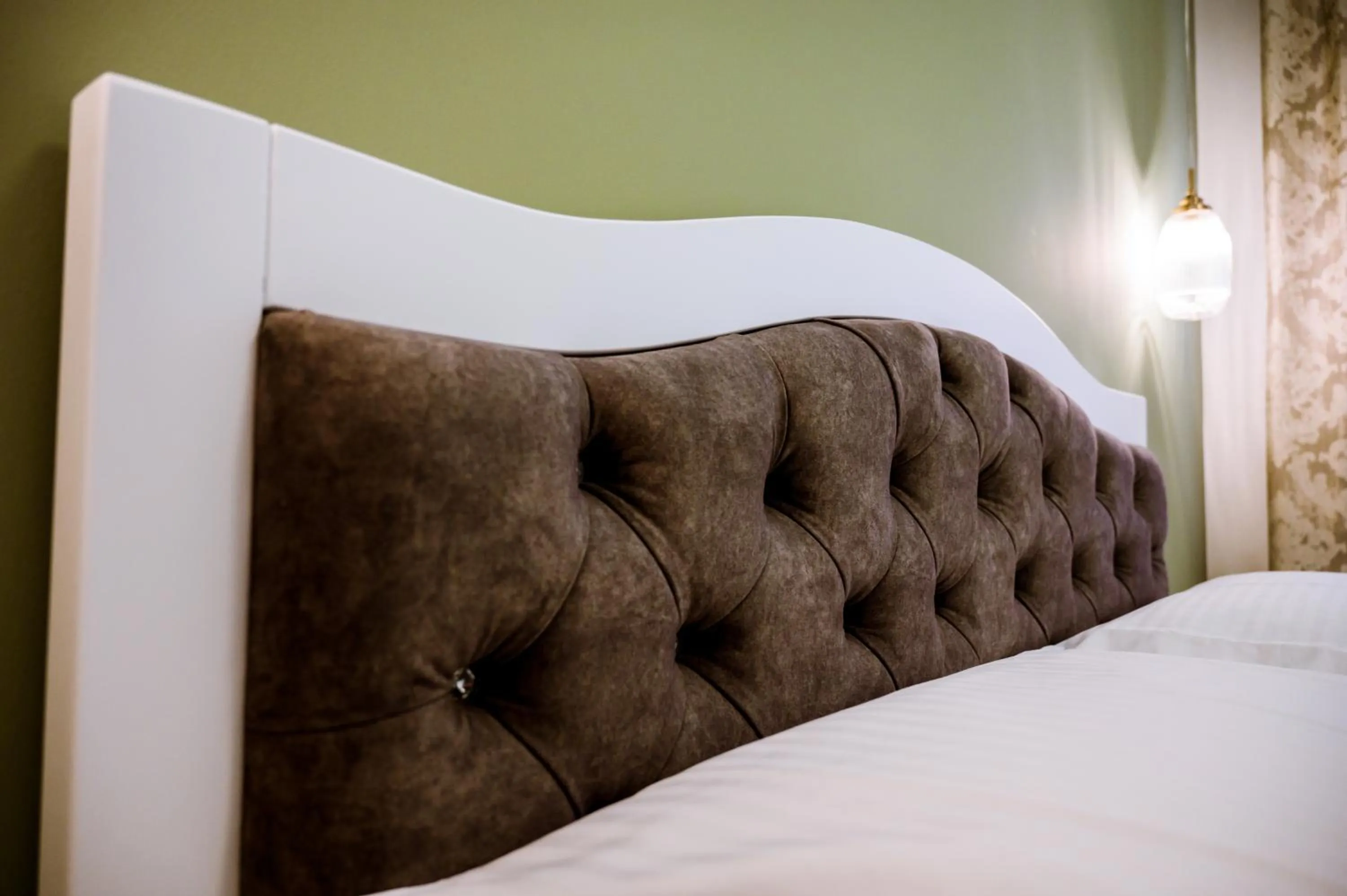 Bed in Konmari Boutique Suites