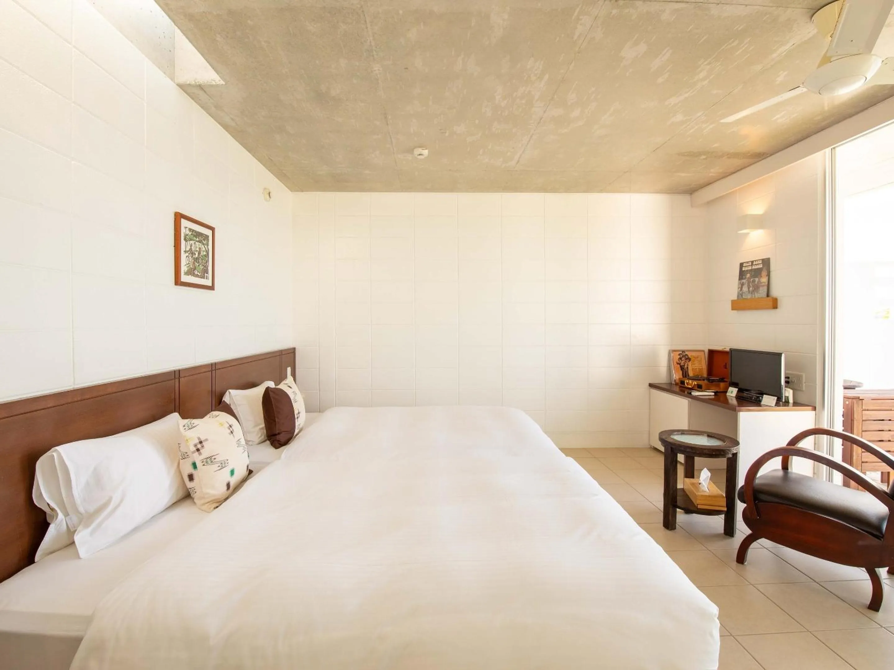 Bed in 413 Hamahiga Hotel＆Cafe