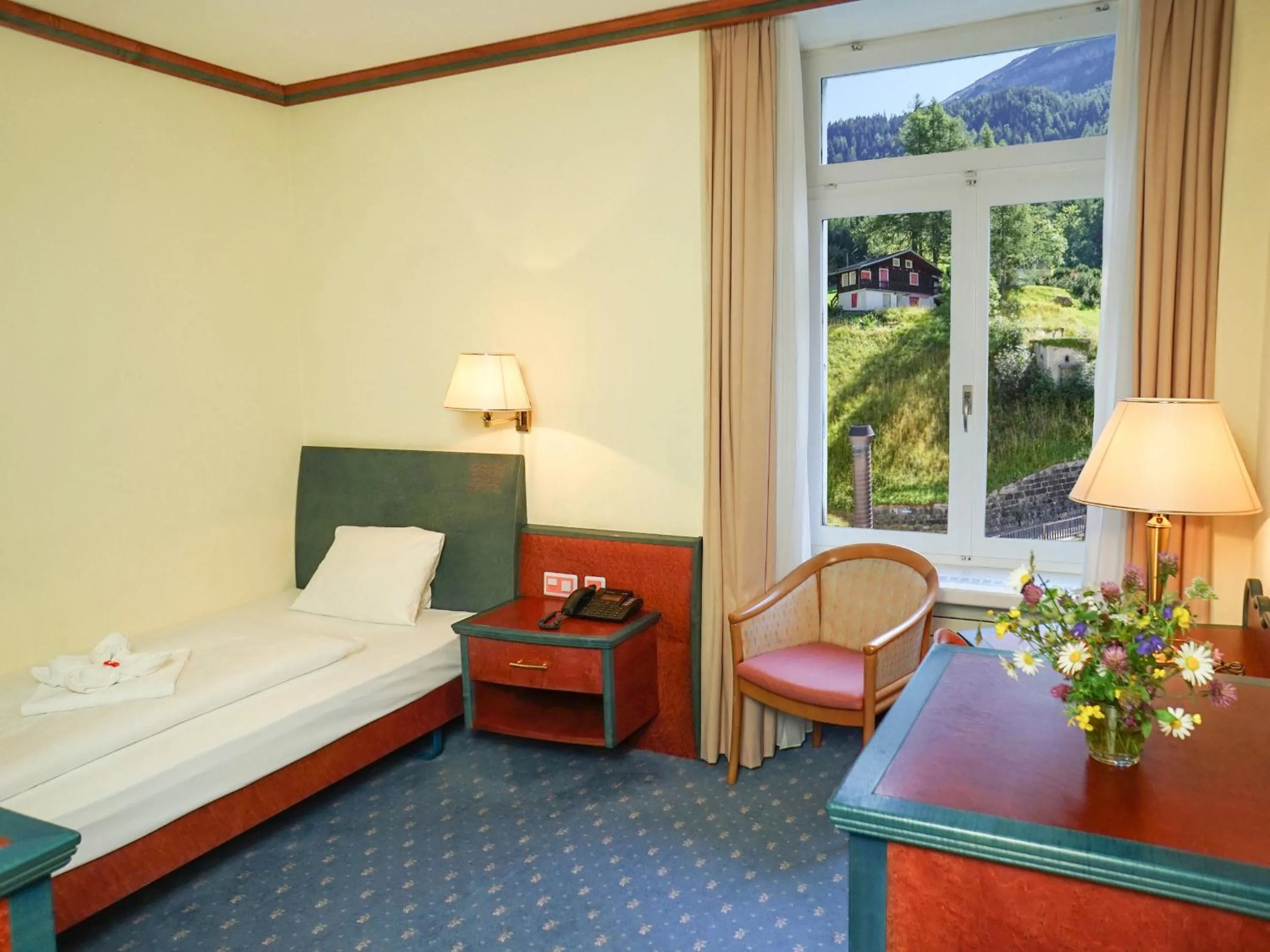 Bedroom, Bed in Thermal Hotels & Walliser Alpentherme Leukerbad