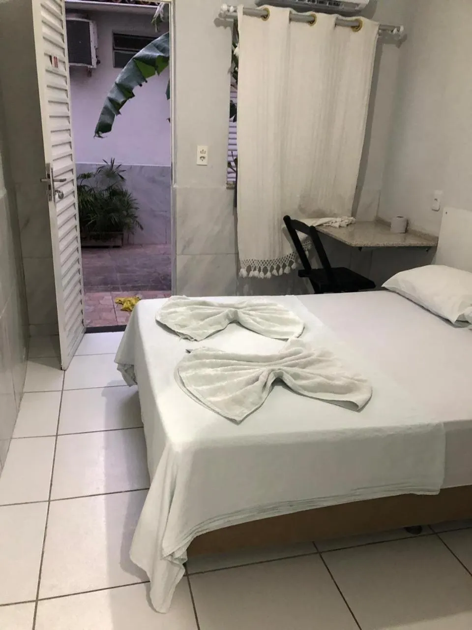 Bed in Hotel Oiticica