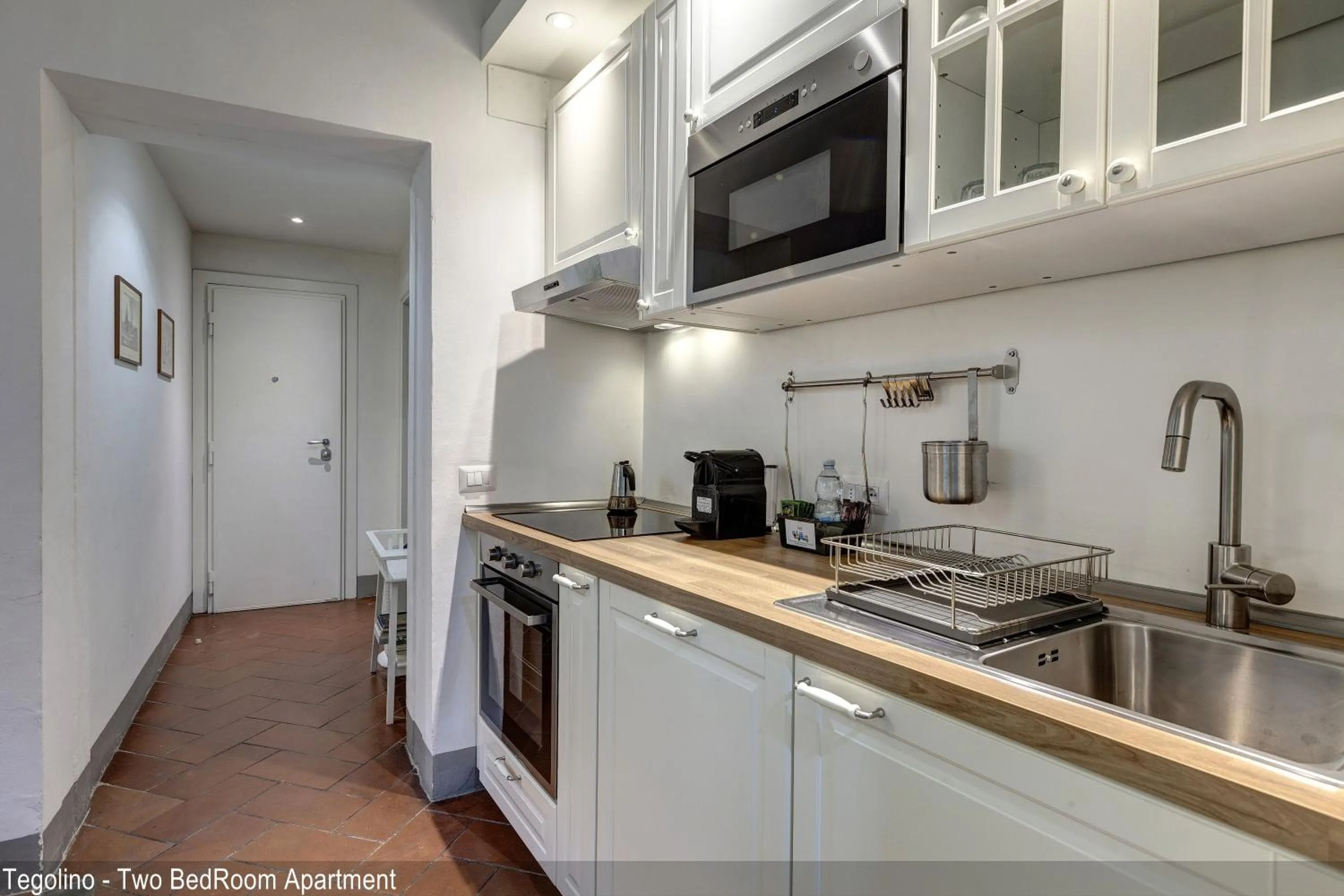 stove in Tegolaio Apartments by Mamo Florence