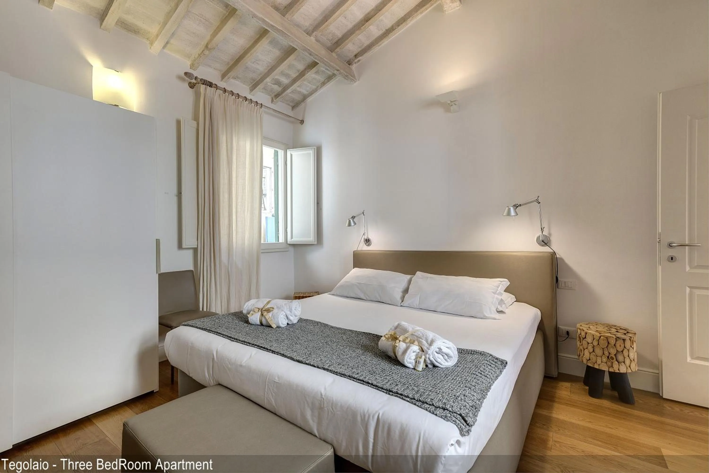 Bed in Tegolaio Apartments by Mamo Florence