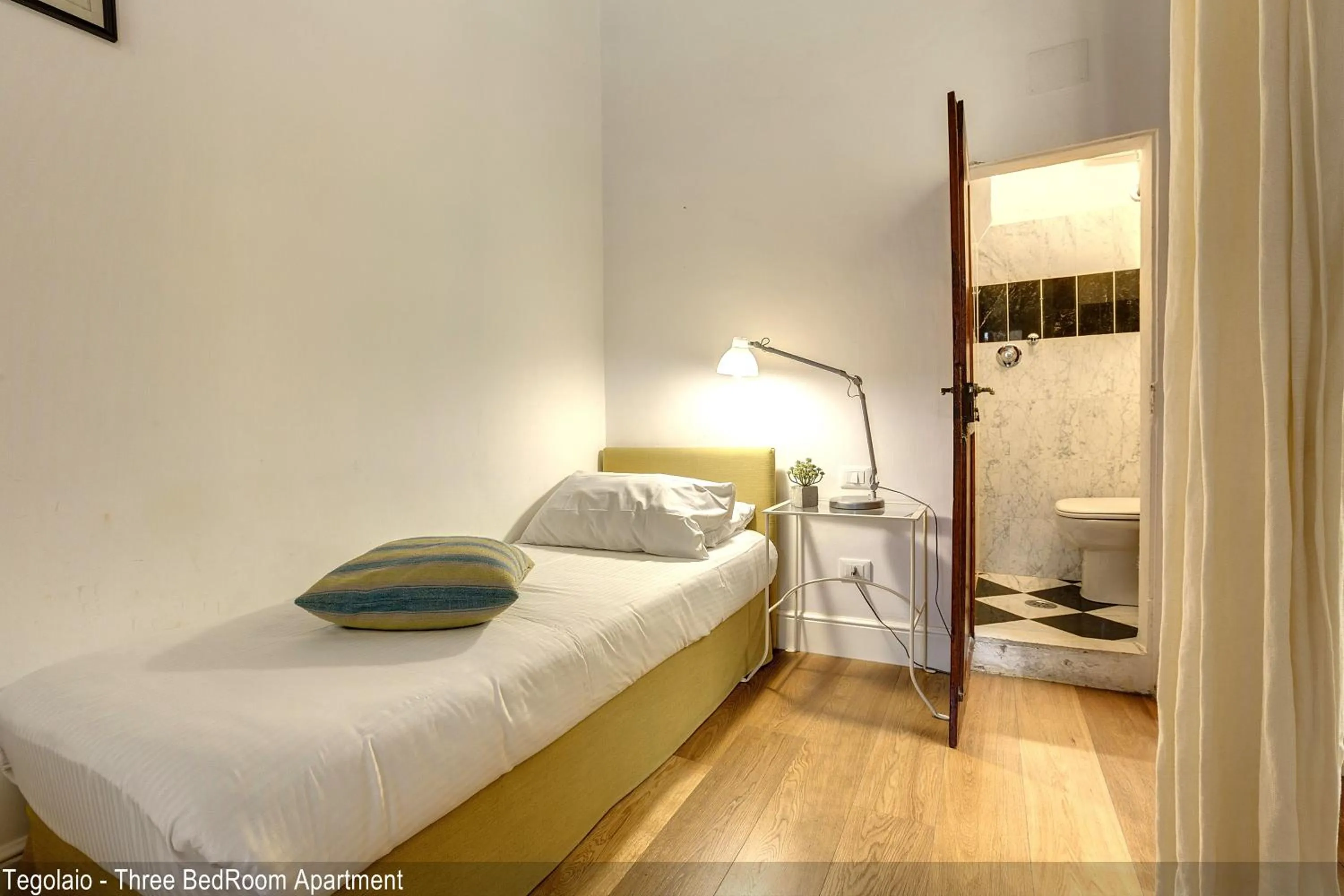 Bedroom, Bed in Tegolaio Apartments by Mamo Florence