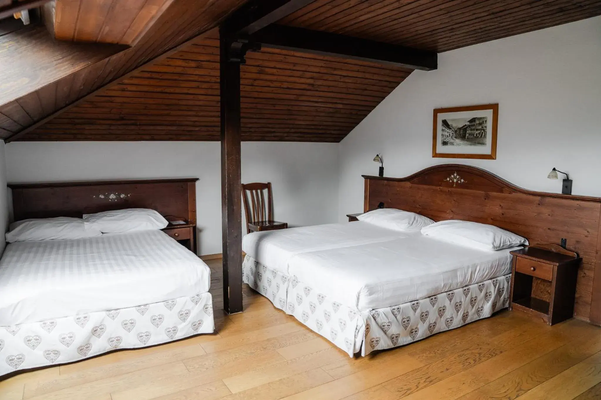 Property building, Bed in Hôtel de Gruyères Property building, Bed in Hôtel de Gruyères
