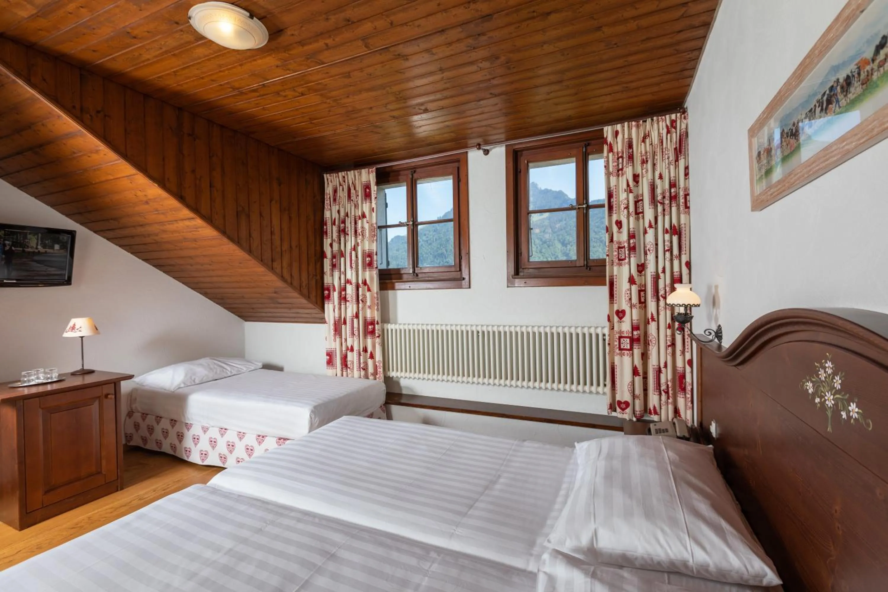 Mountain view, Bed in Hôtel de Gruyères