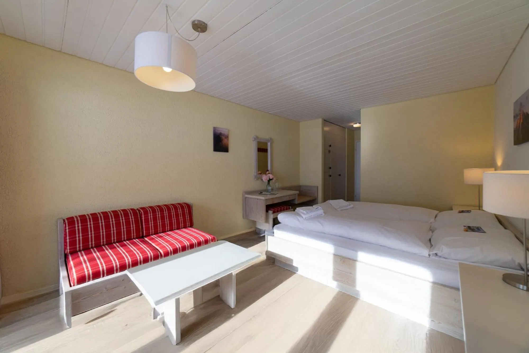 Bed in Hotel Säntis Lodge