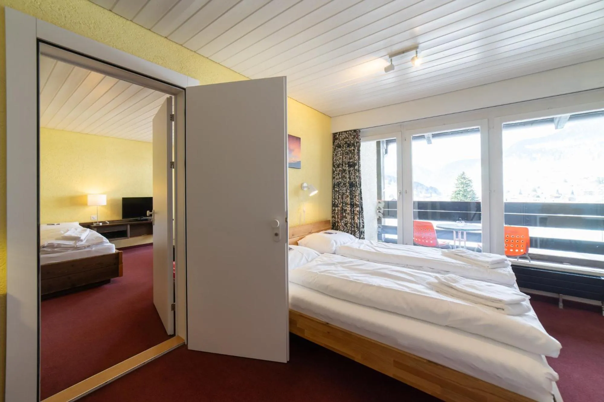 Bed in Hotel Säntis Lodge