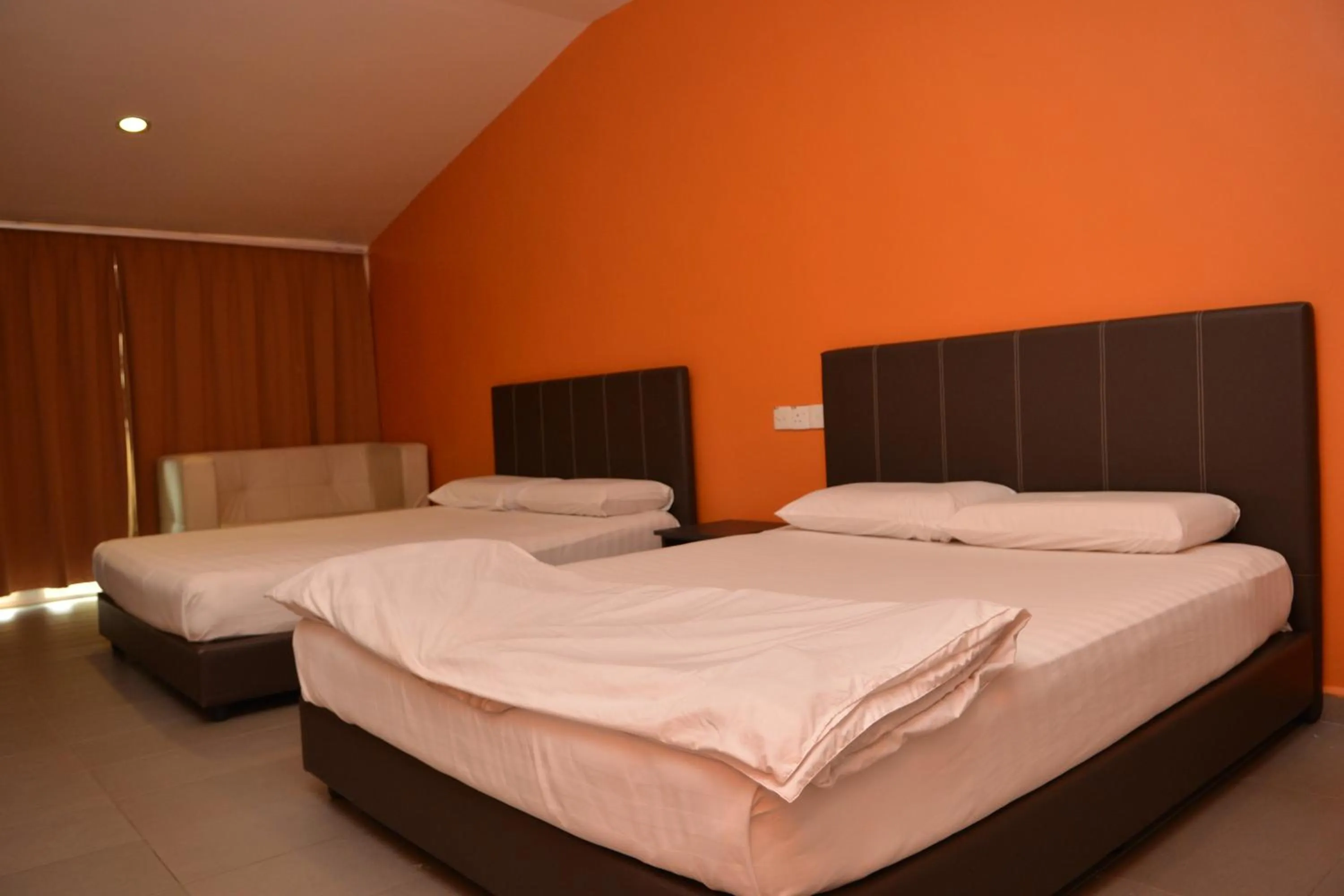 Bed in GF WONDERFUL HOTEL