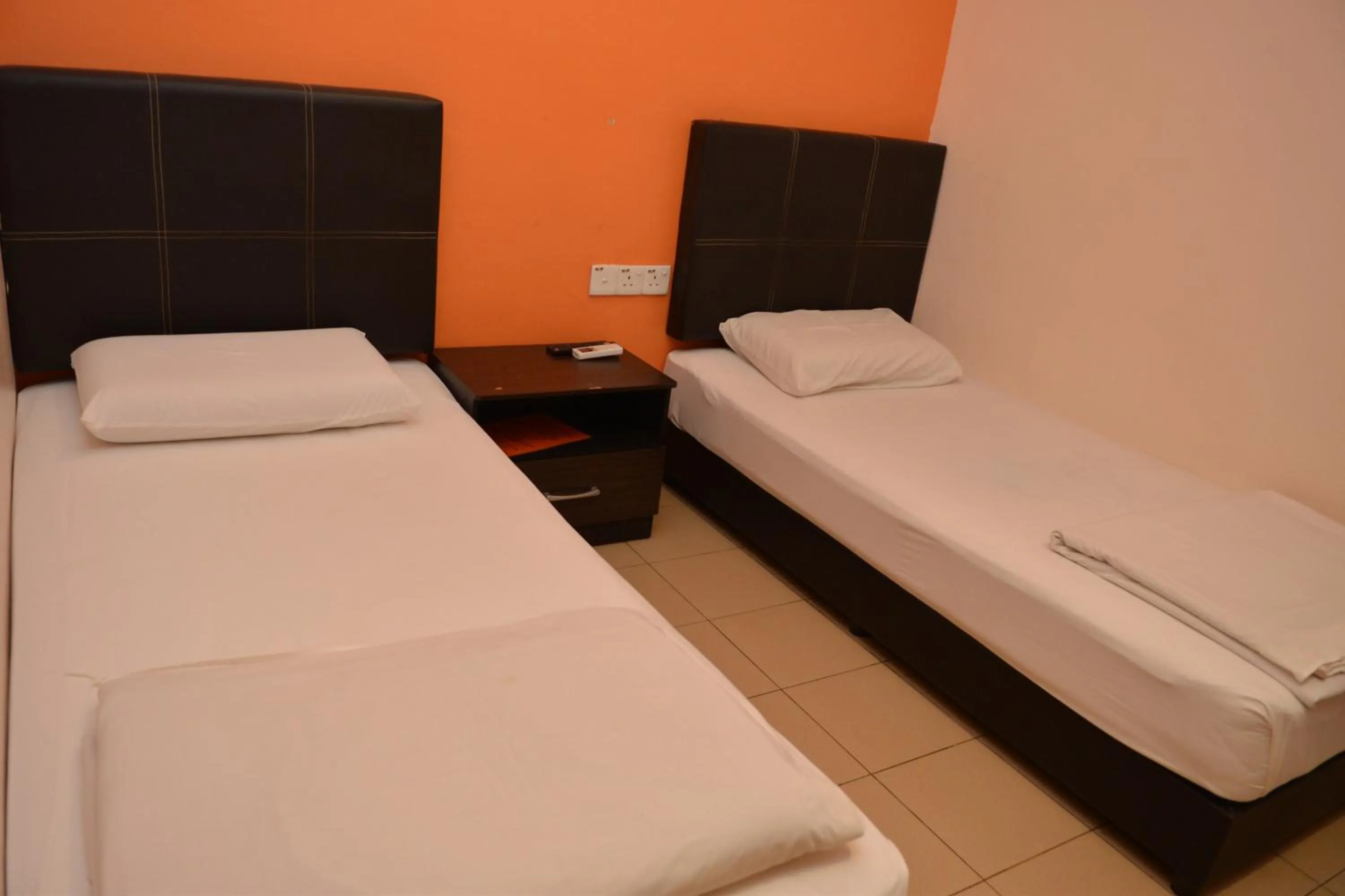 Bed in GF WONDERFUL HOTEL