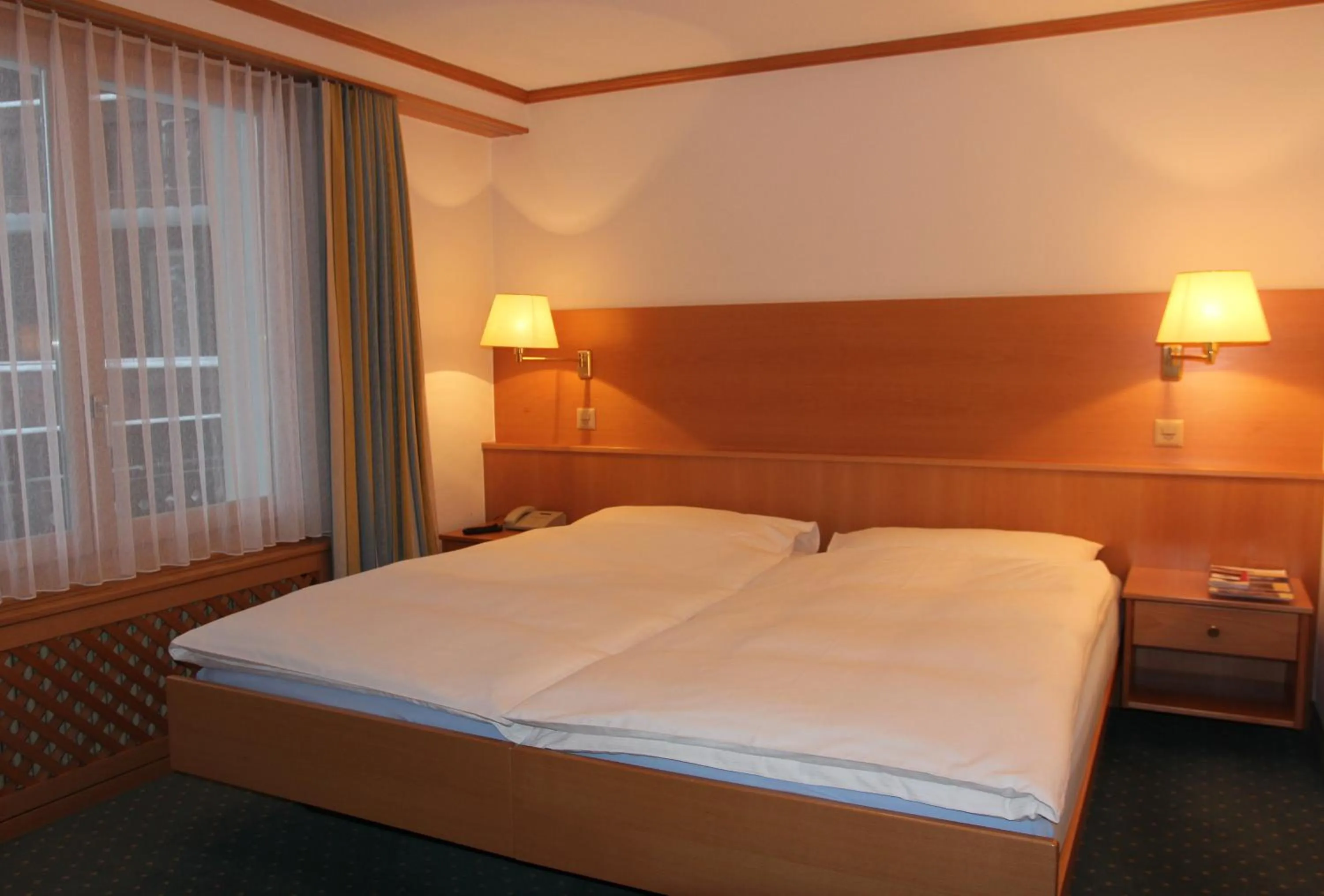 Bed in Hotel Metropol & Spa Zermatt