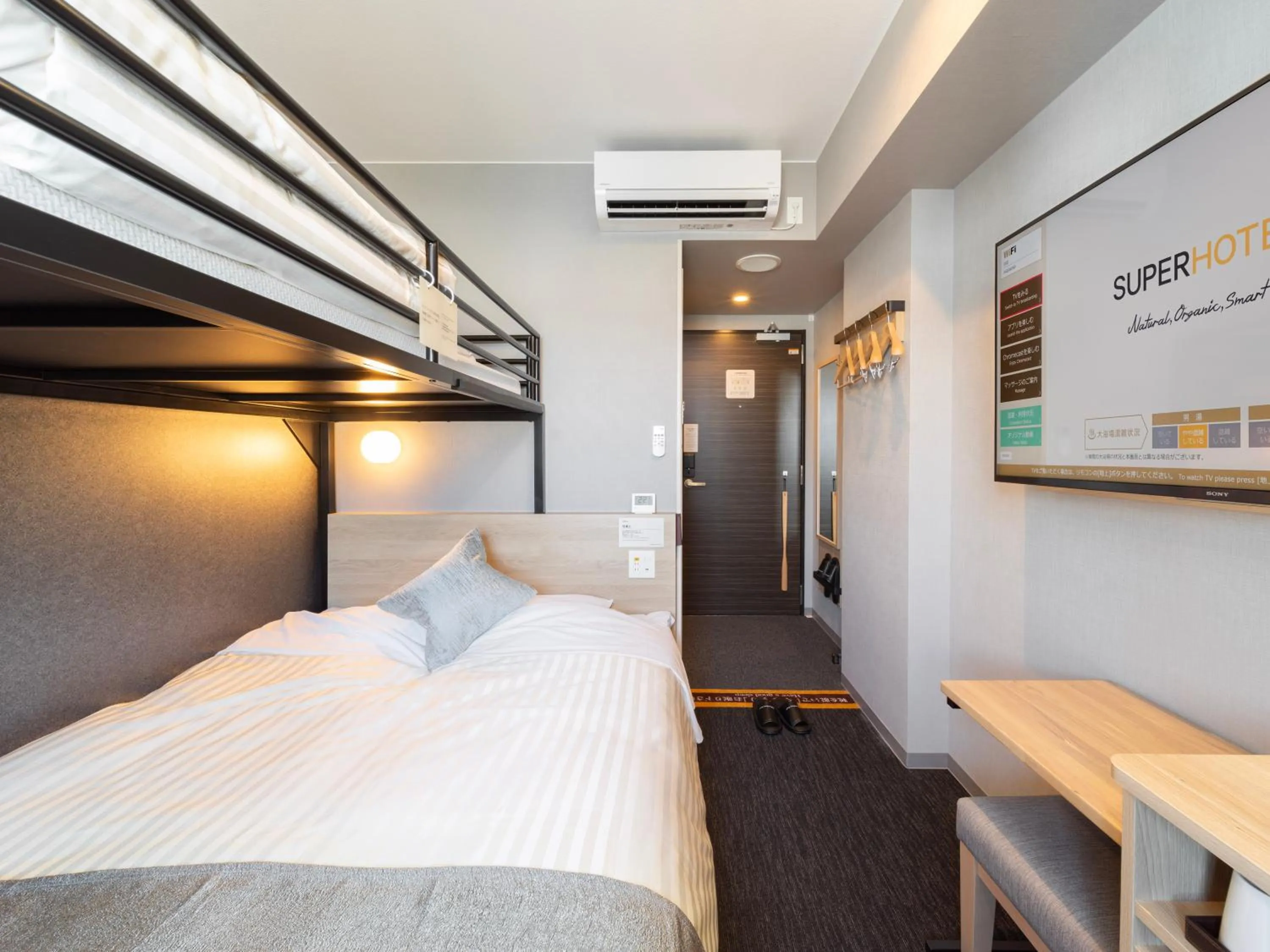 Bed in Super Hotel Premier Kanazawaeki Higashiguchi