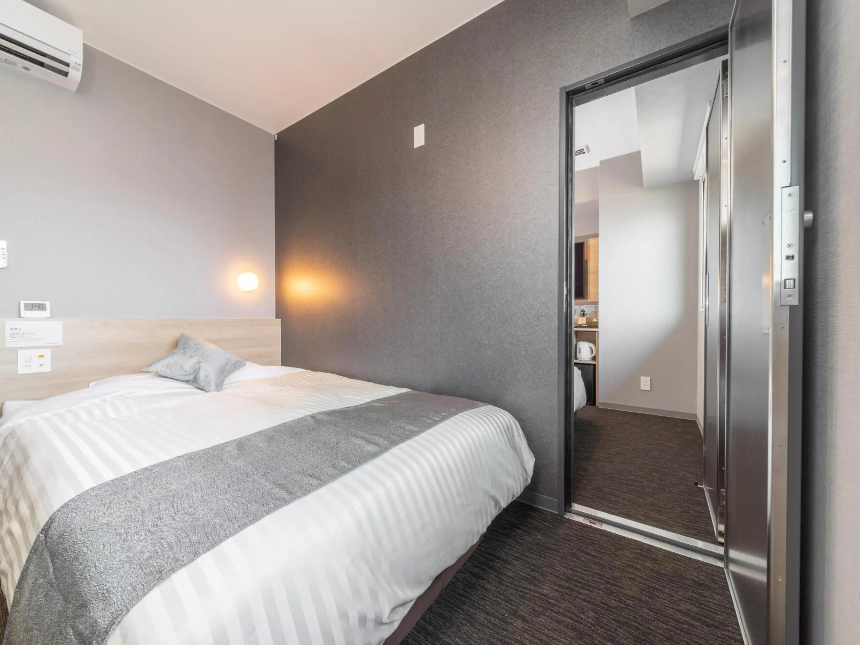 Bed in Super Hotel Premier Kanazawaeki Higashiguchi Bed in Super Hotel Premier Kanazawaeki Higashiguchi