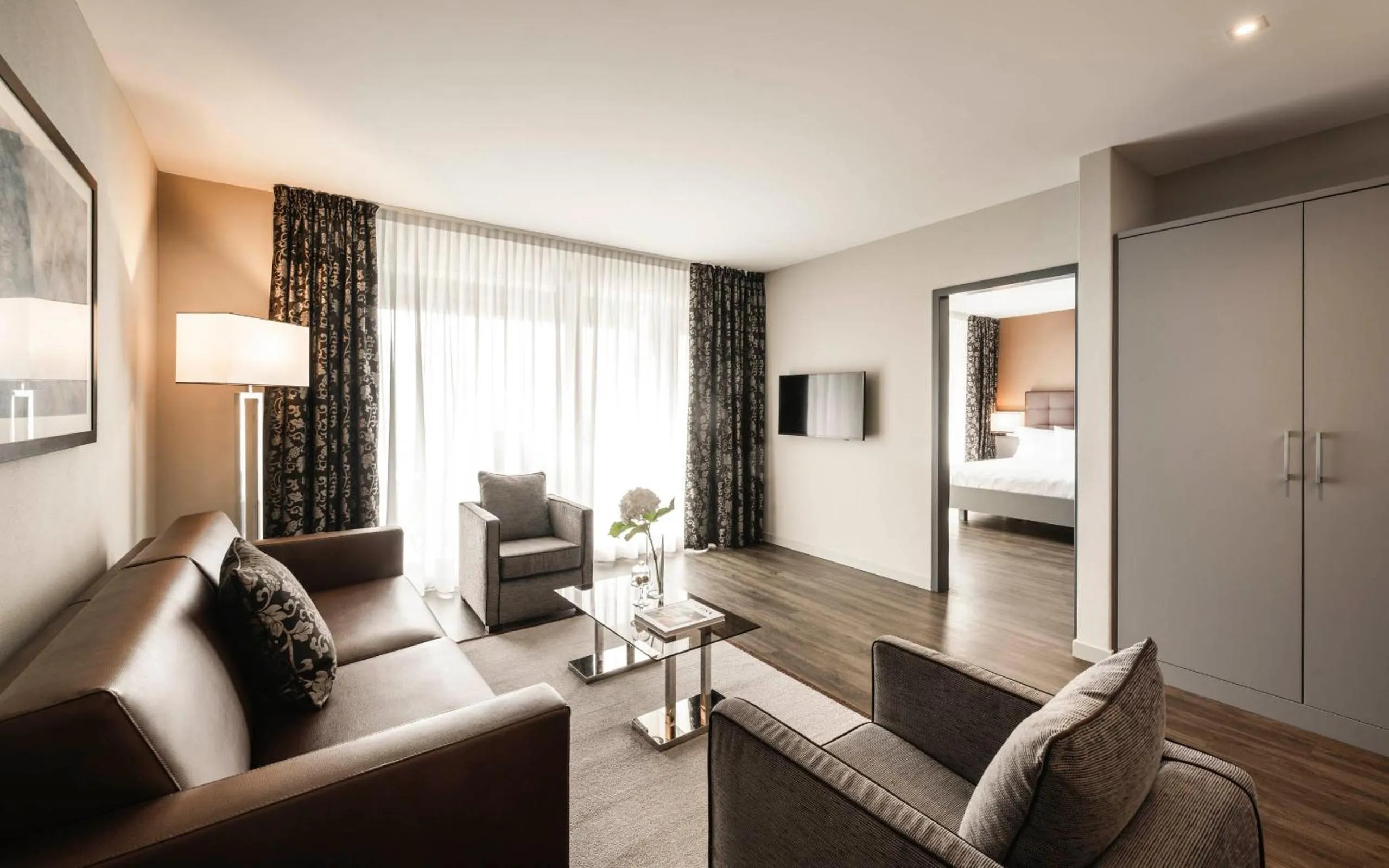 Living room, Bed in Hotel Belvedere Locarno