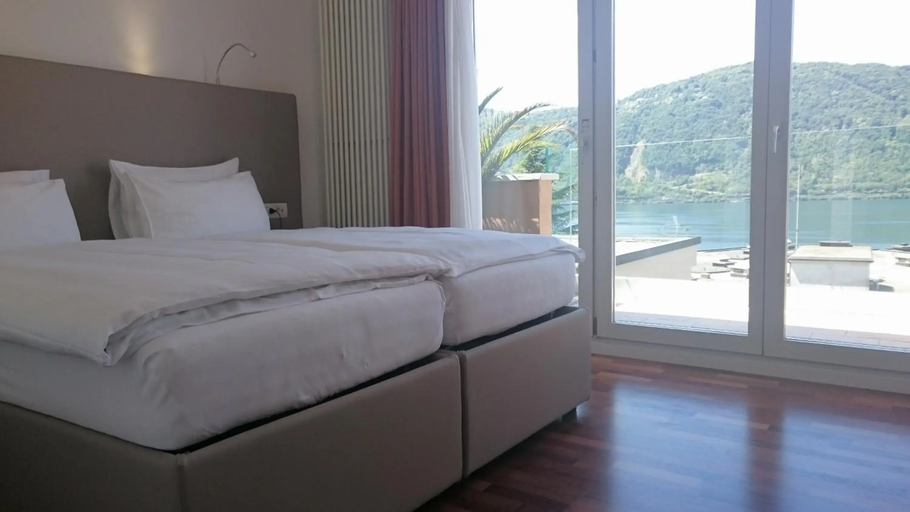 Bed in Hotel Campione Bed in Hotel Campione