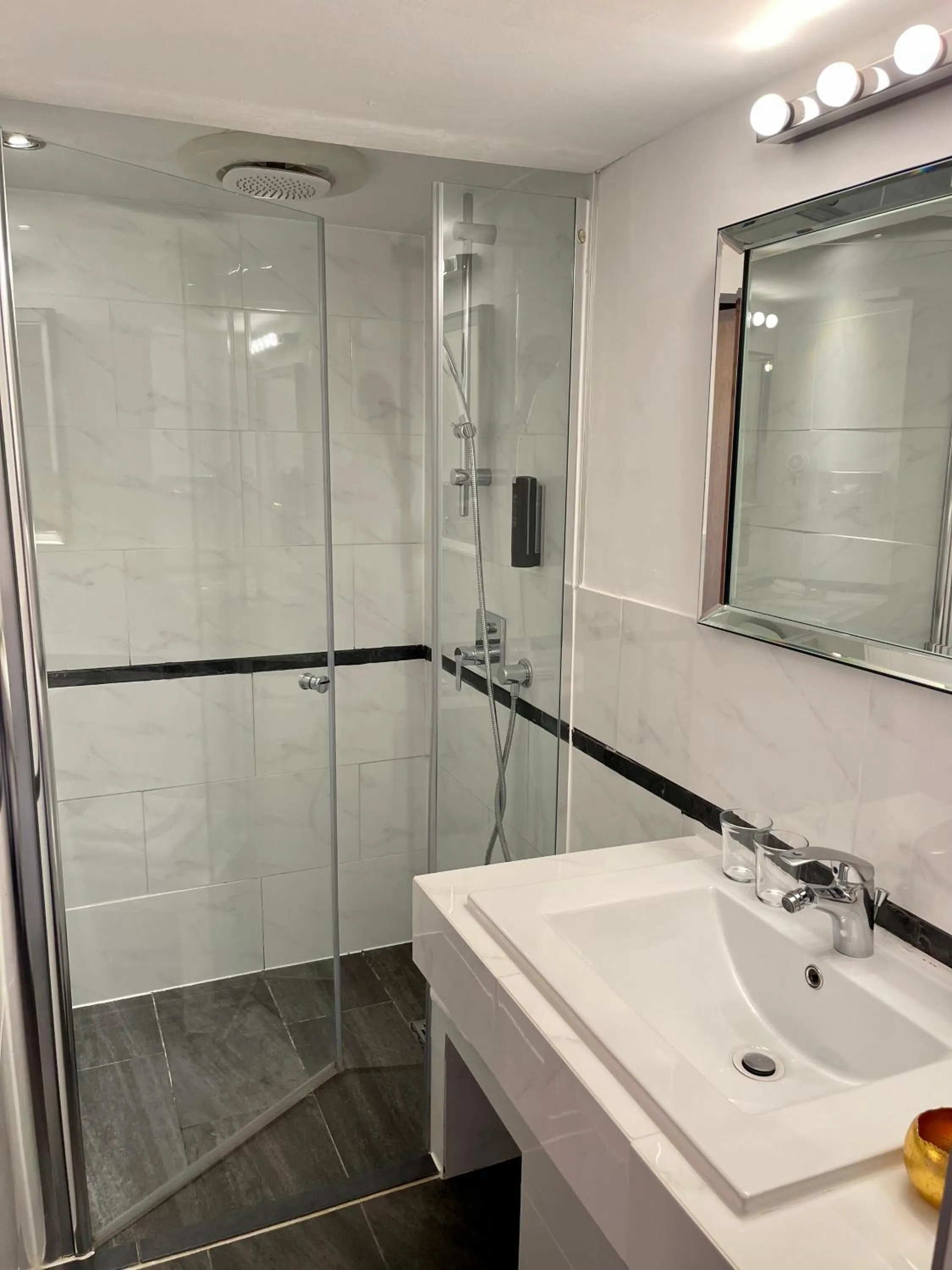 Bathroom in Chalet Hotel Adler