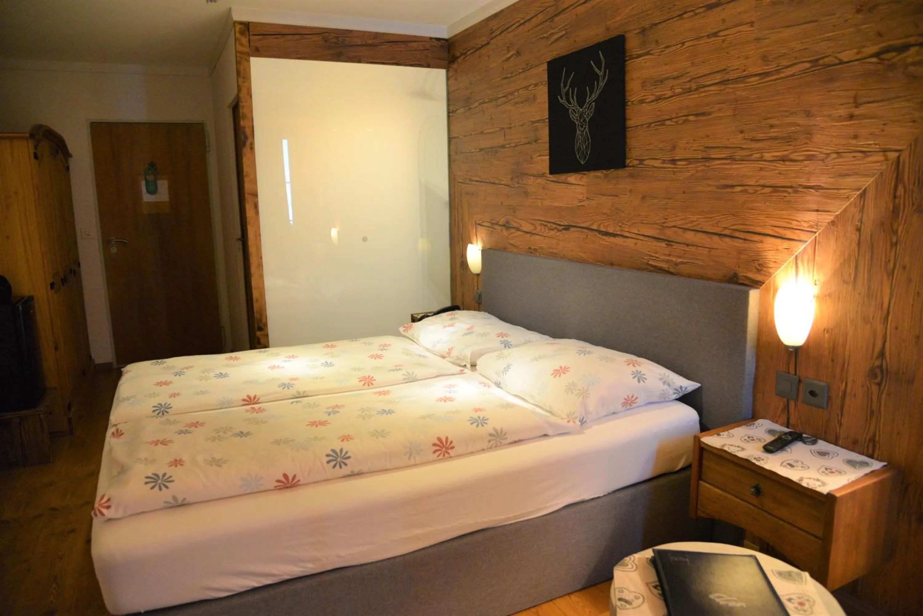 Bed in Chalet Hotel Adler