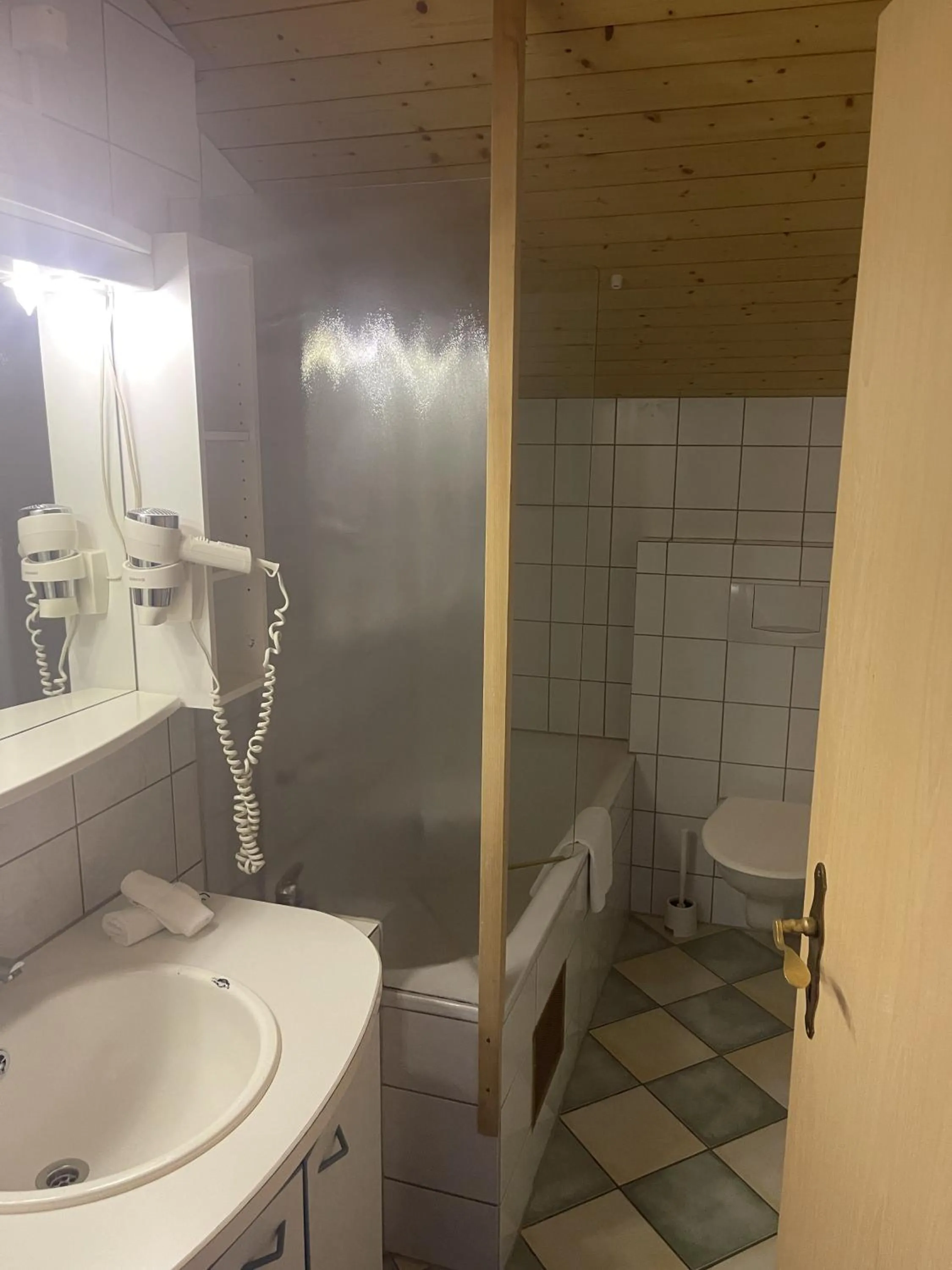 Bathroom in Chalet Hotel Adler