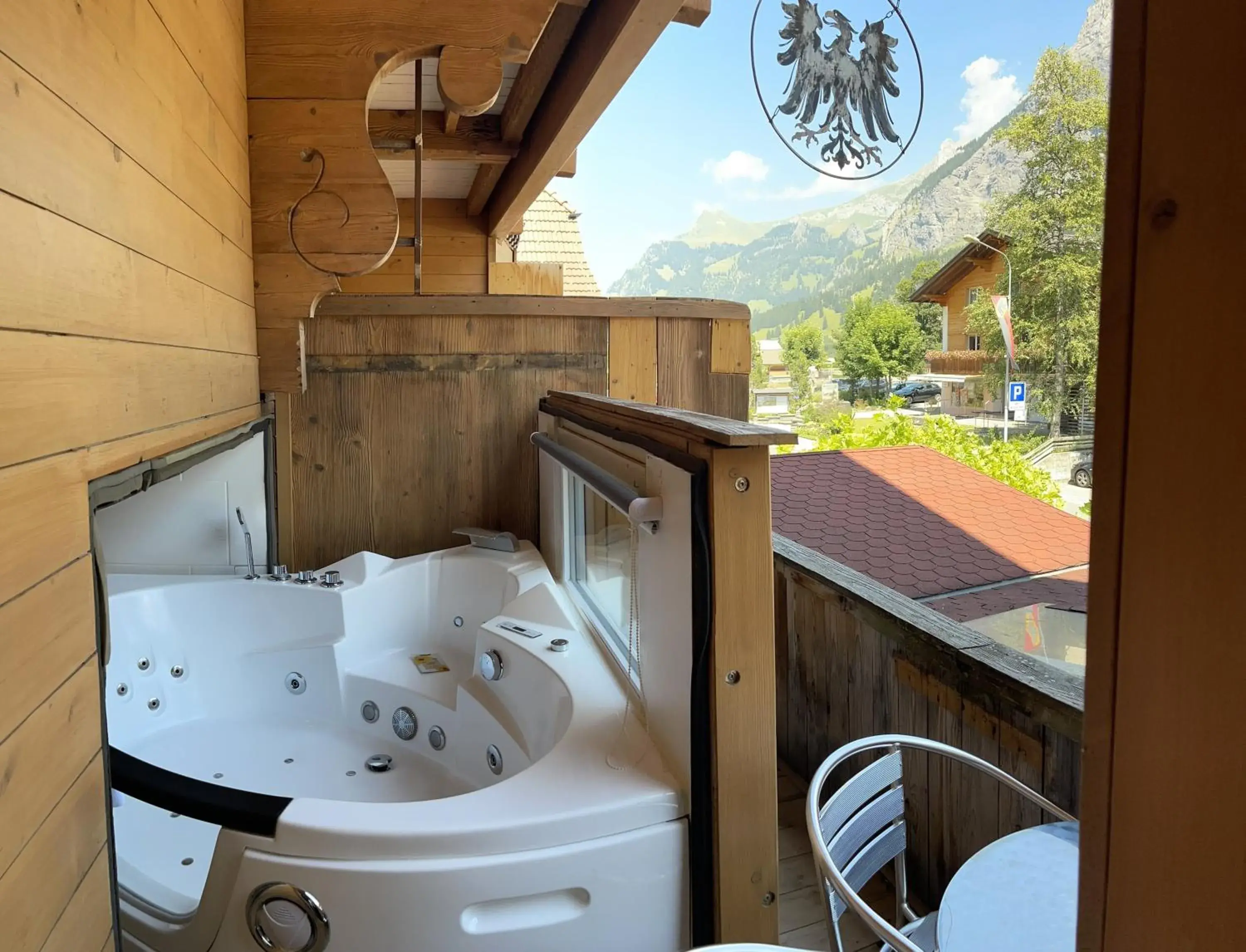 Superior Room Plus with rolling-out Whirlpool and round Bed - single occupancy in Chalet Hotel Adler Superior Room Plus with rolling-out Whirlpool and round Bed - single occupancy in Chalet Hotel Adler