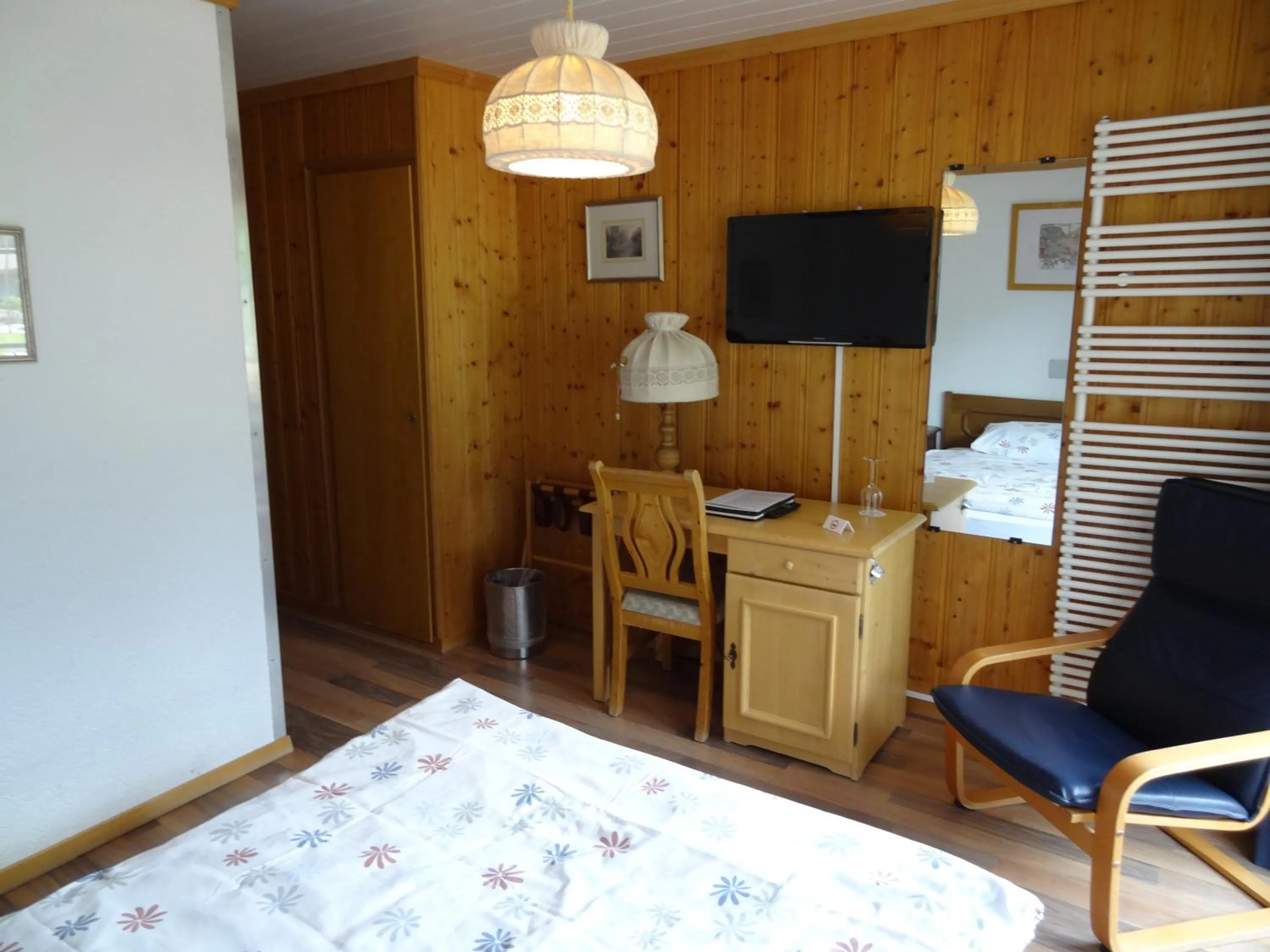 Bed in Chalet Hotel Adler