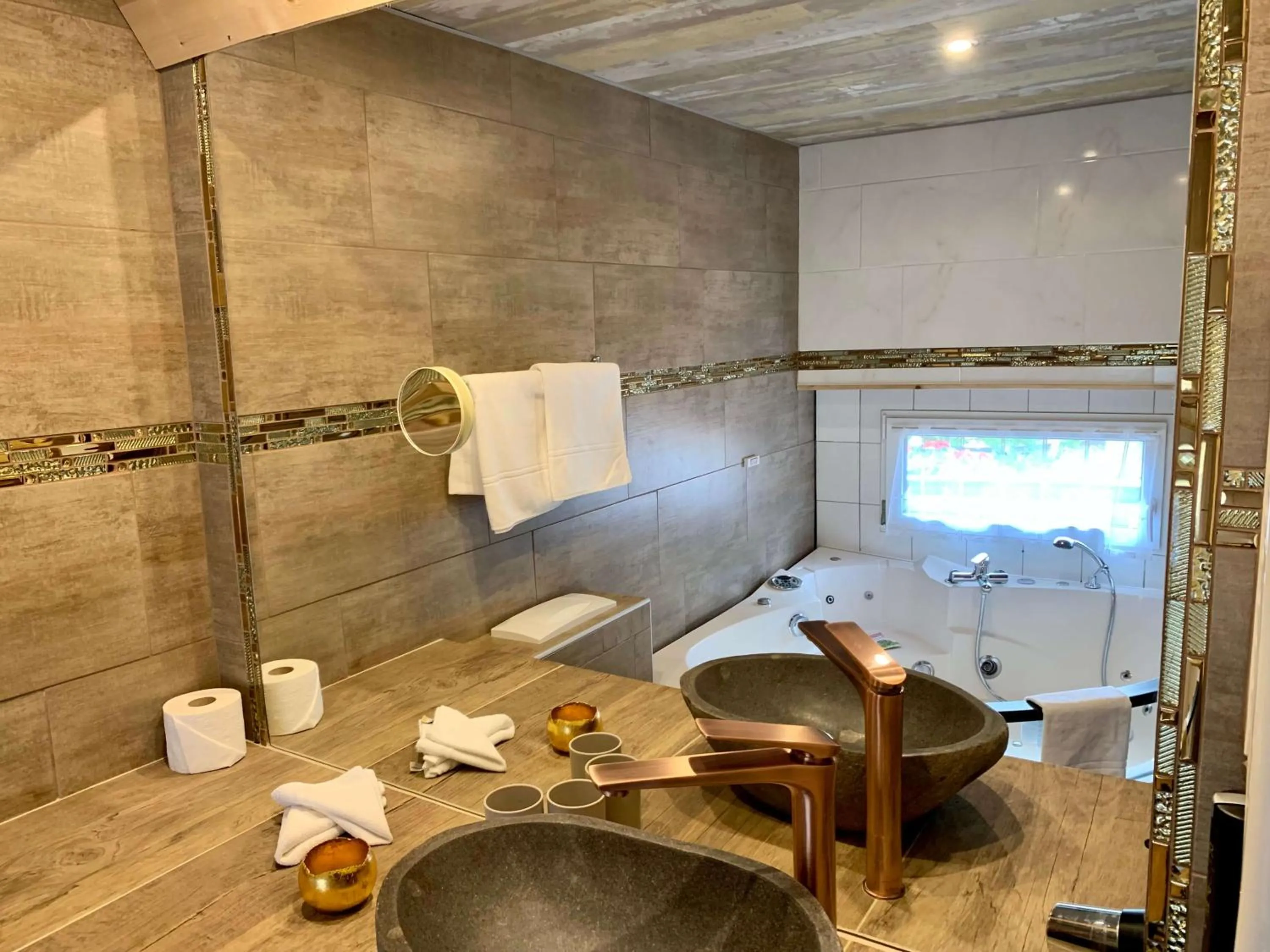 Bathroom in Chalet Hotel Adler