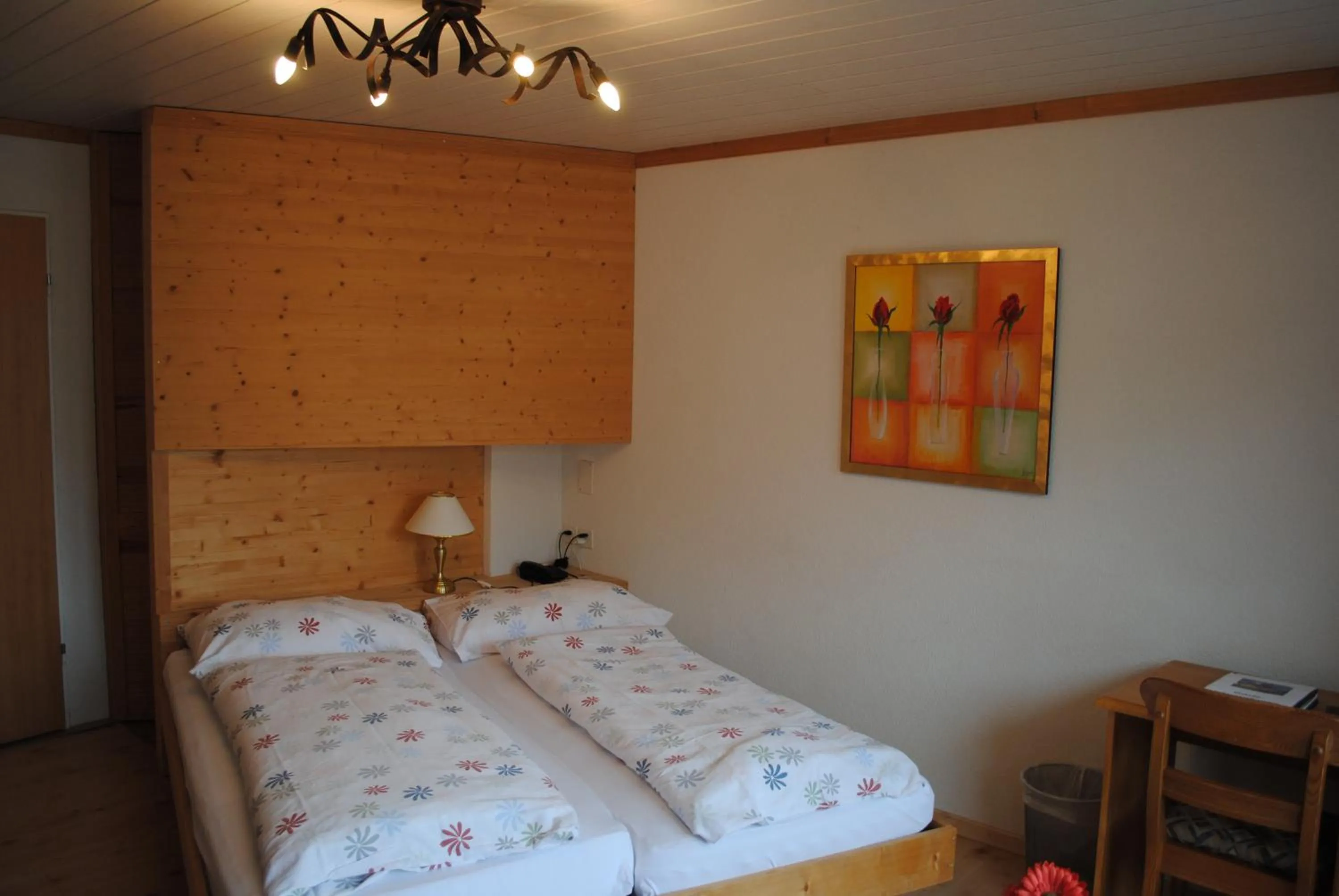 Bed in Chalet Hotel Adler