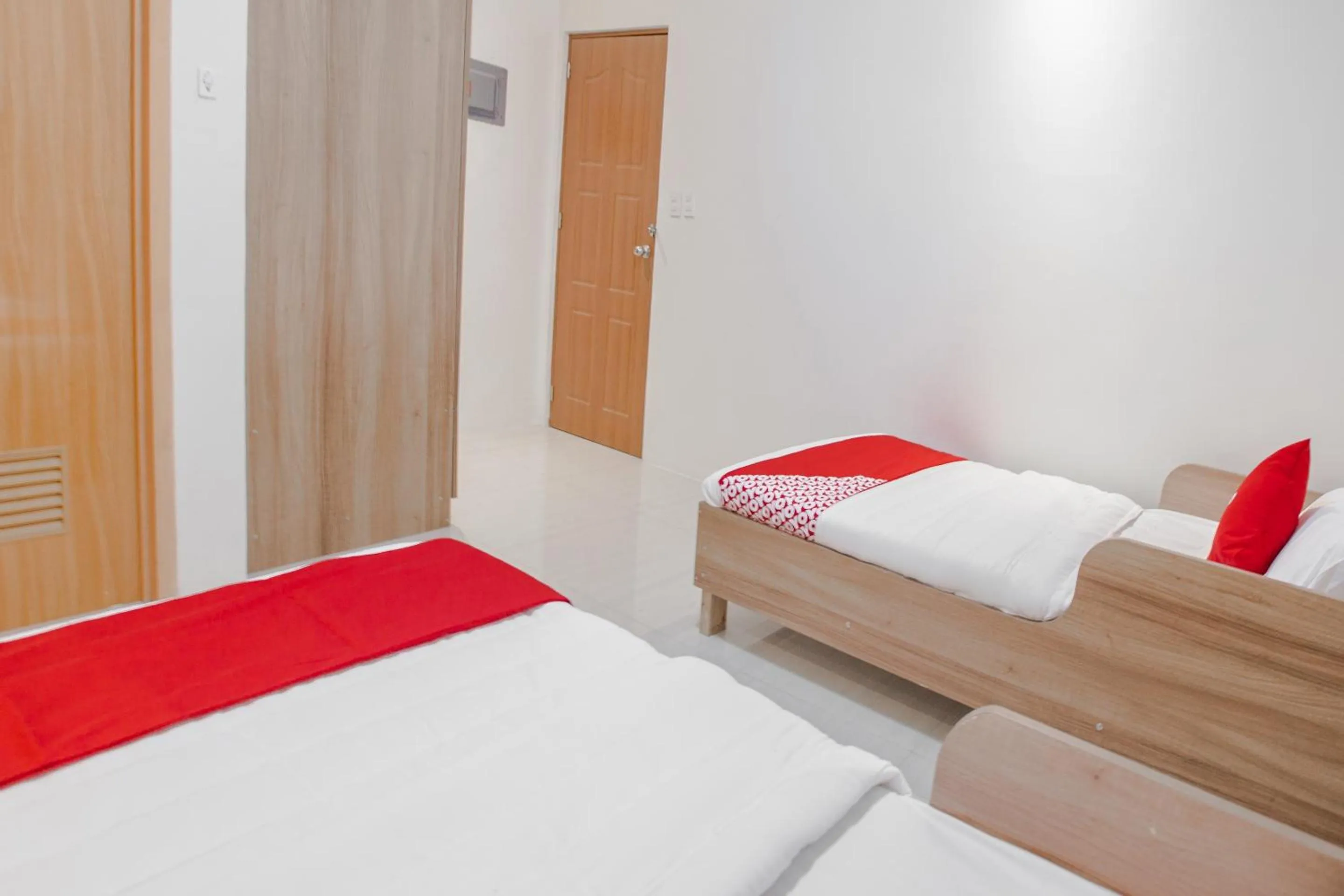 Bedroom in OYO 605 The Quarters