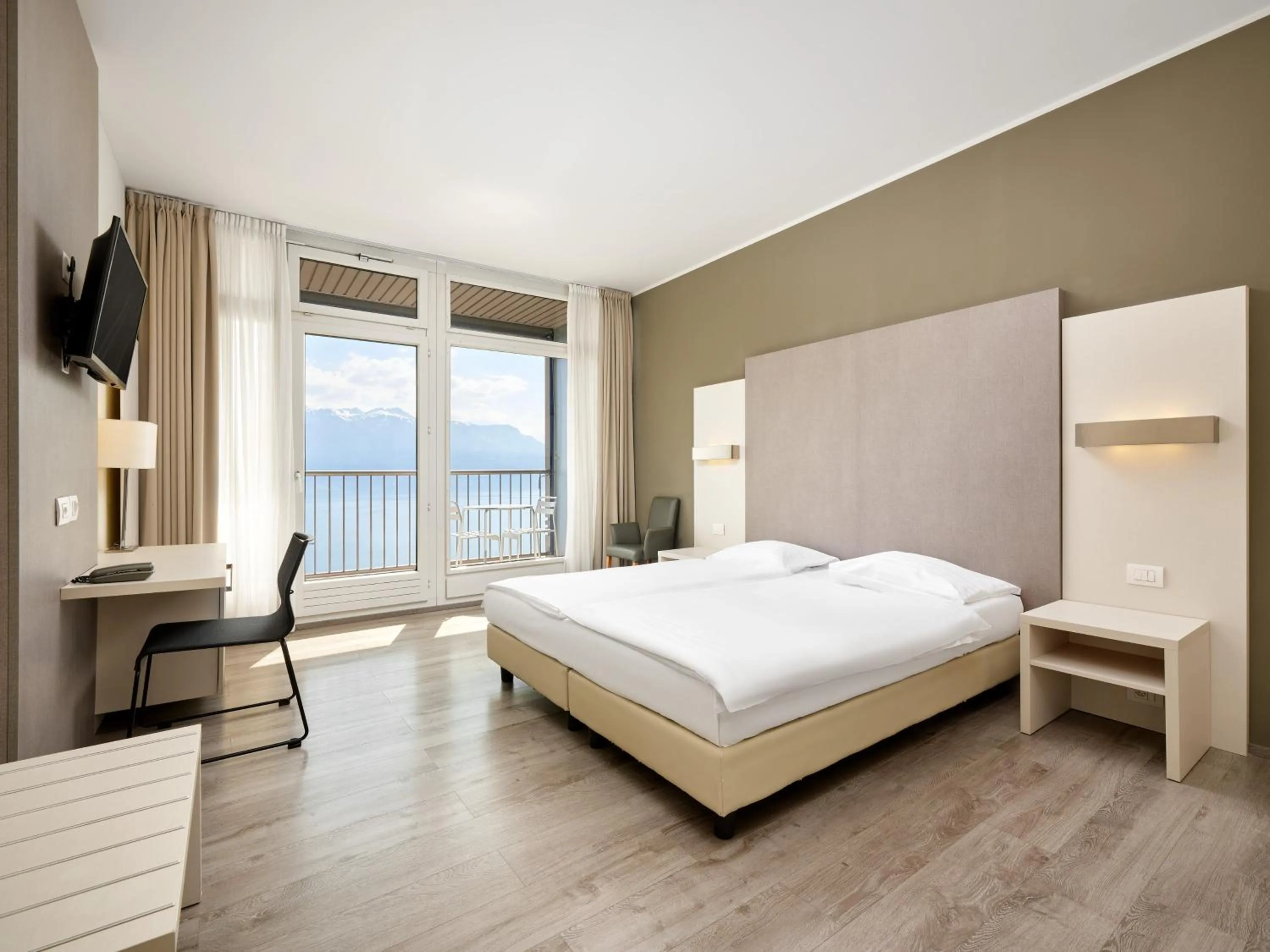 Bed in Hôtel Prealpina